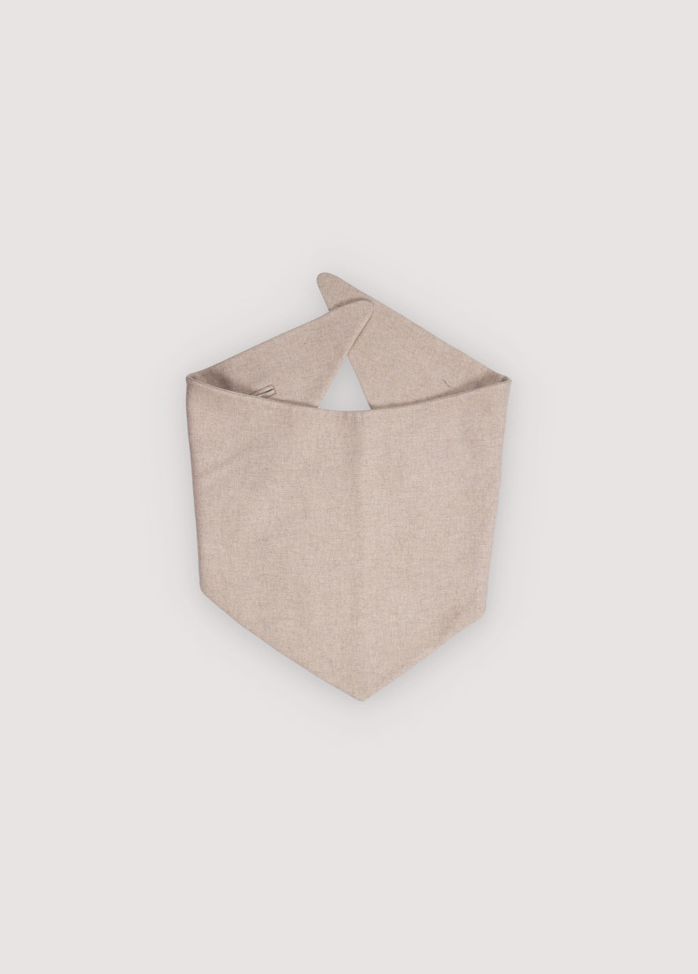 Triangular wool scarf with a side slit. Perfect for pairing with the matching wool coat.