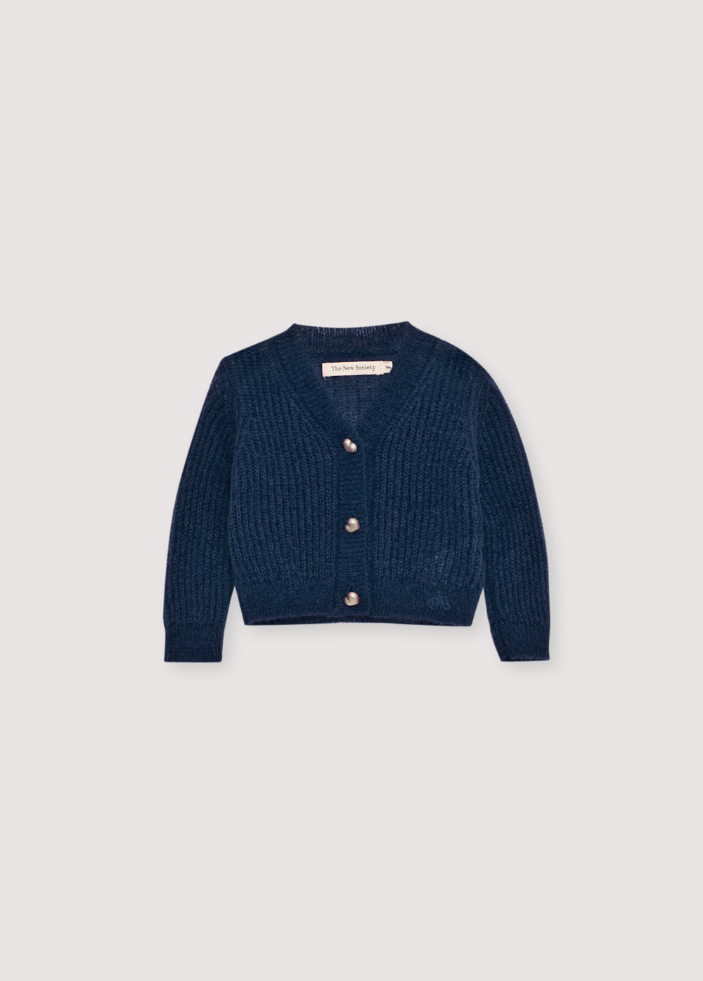 Fine rib knit mohair cardigan with a V-neck and original silver heart-shaped buttons. It pairs perfectly with matching knit leggings for a complete look.