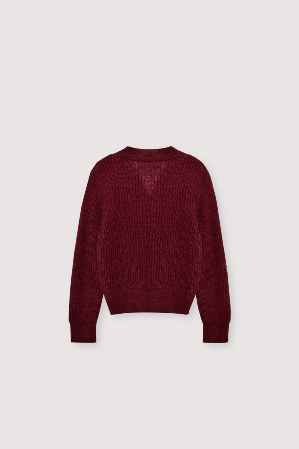 Fine rib-knit mohair cardigan with a flattering V-neckline and distinctive silver heart-shaped buttons. Finished with tonal TNS embroidery on the hem rib, it pairs effortlessly with the matching knit leggings for a cozy yet refined look.