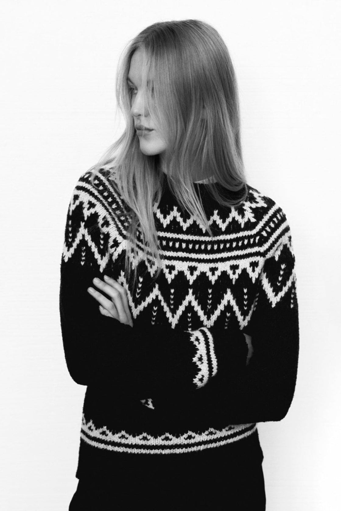 Wool sweater with a beautiful jacquard contrast detail on the front, back, and sleeves.