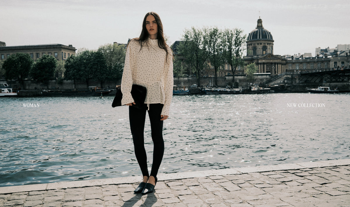 The Polka Woman Blouse is a refined everyday piece crafted from a lightweight viscose blend that offers a fluid drape and soft feel.