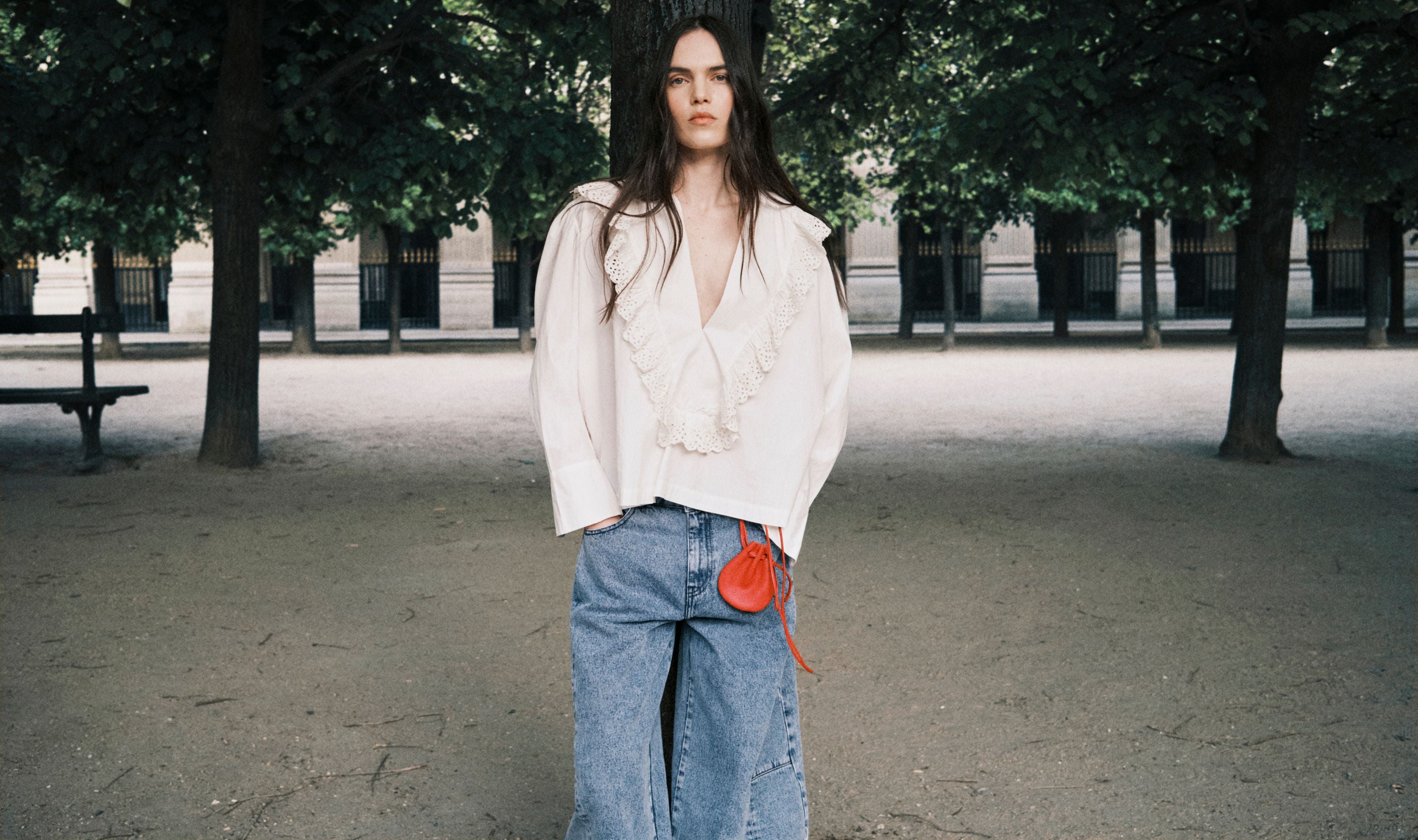 The TNS Denim Woman Curved Trouser&nbsp;bring a modern perspective o everyday denim. Crafted from premium cotton with a washed blue finish, the contemporary curved-leg silhouette is shaped through sculptural side seams, knee darts and hem darts for a refined, effortless fit.