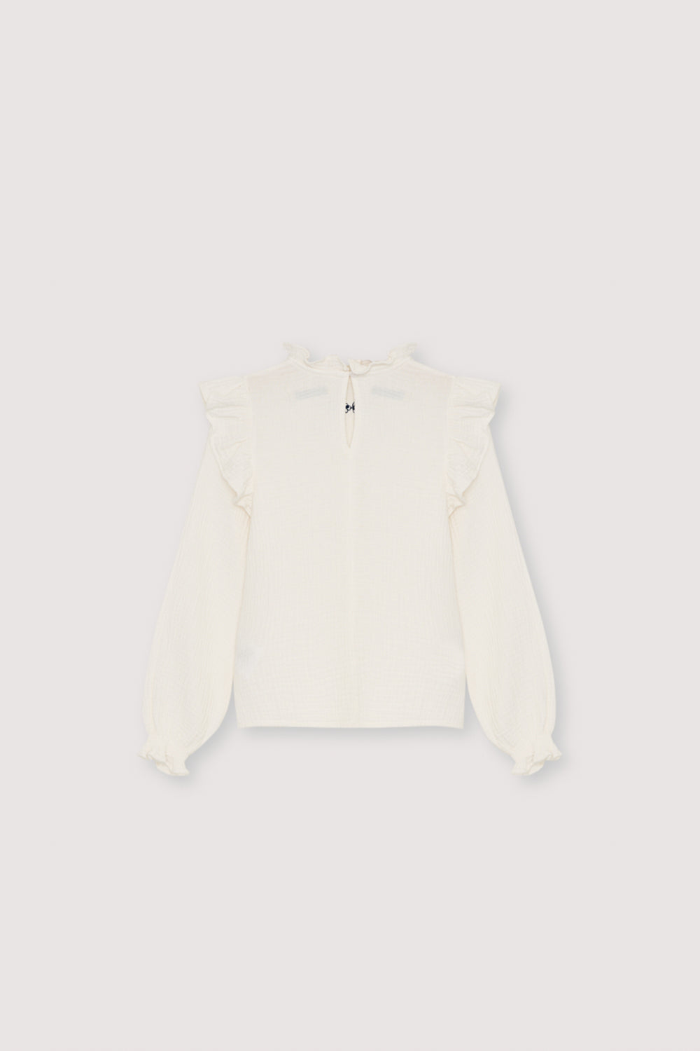 One of our signature double gauze blouse styles, featuring a contrasting embroidery detail at the front for a subtle yet elegant touch. Made from soft, breathable 100% cotton.