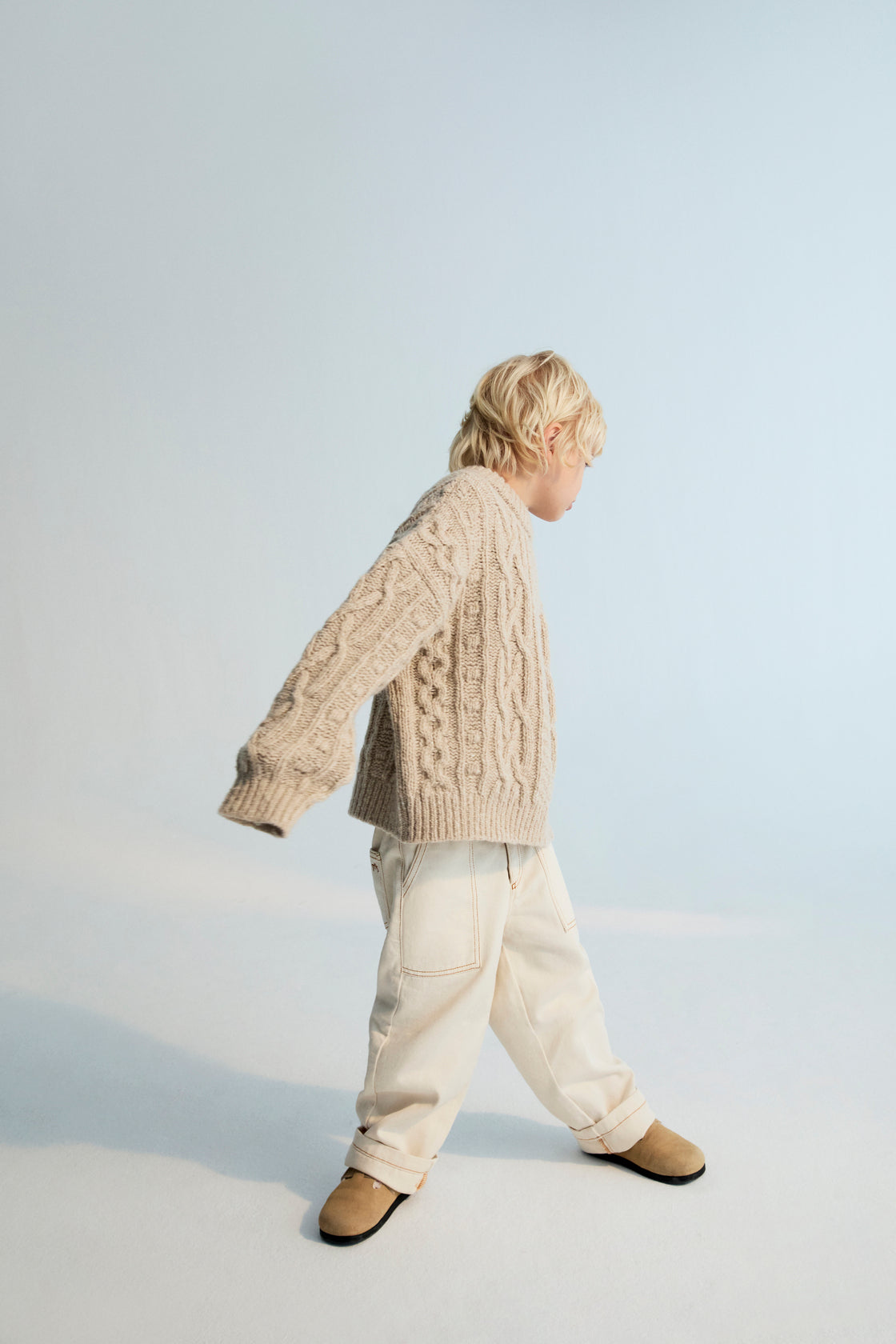 One of our classic knit patterns, this time crafted in recycled wool quality with a new textured knit design.