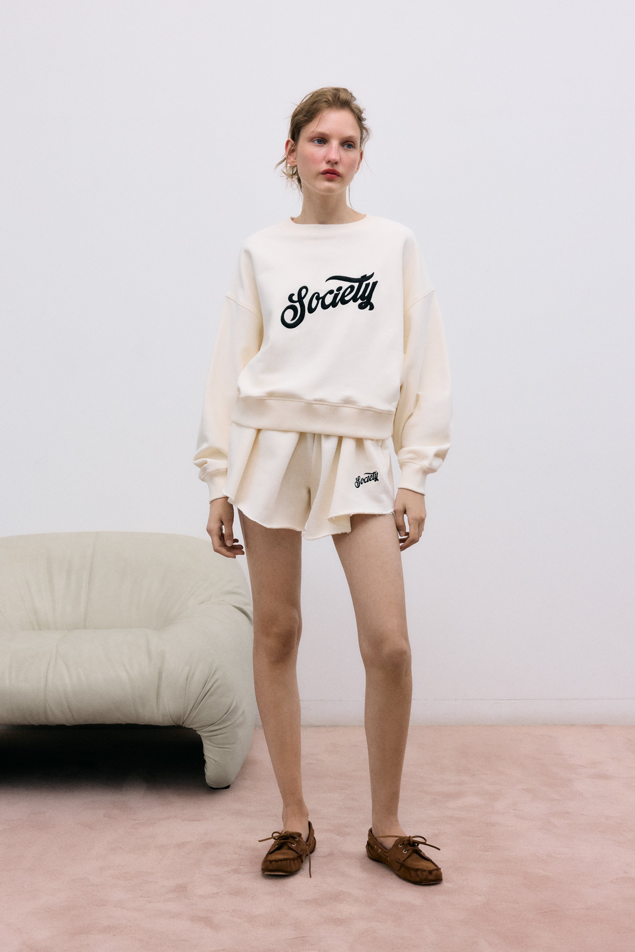 Soft cotton fleece shorts with a wide fit and elastic waistband for comfort.