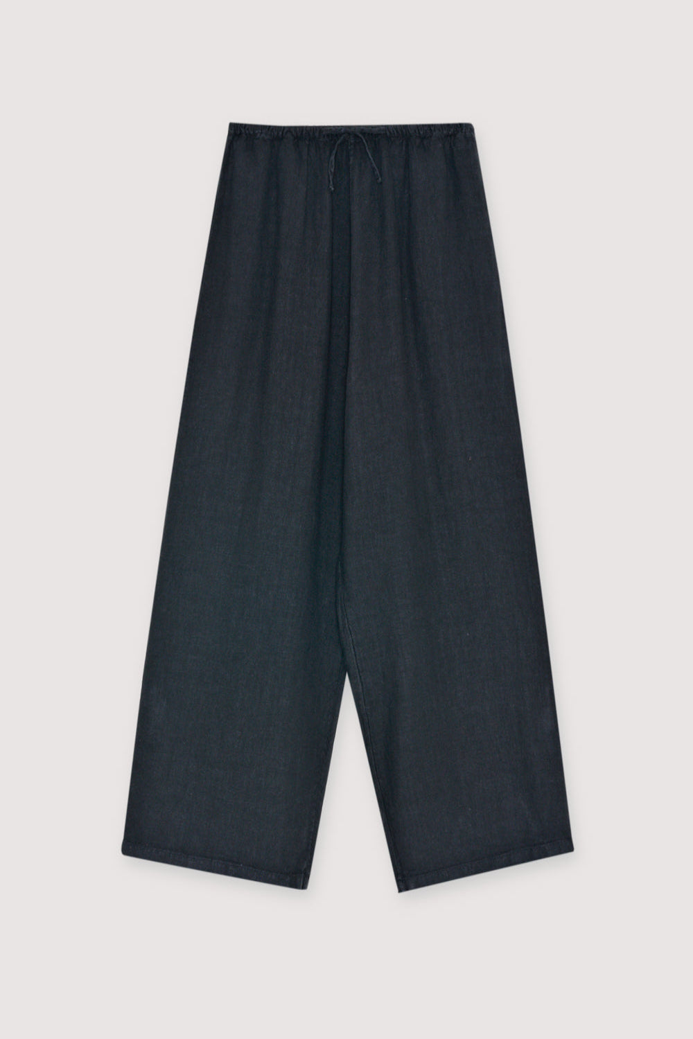 Linen trousers with a wide, cropped fit, crafted in soft, breathable linen. Features side pockets and a fine adjustable waistband with drawstring, perfect to pair with any piece from the collection
