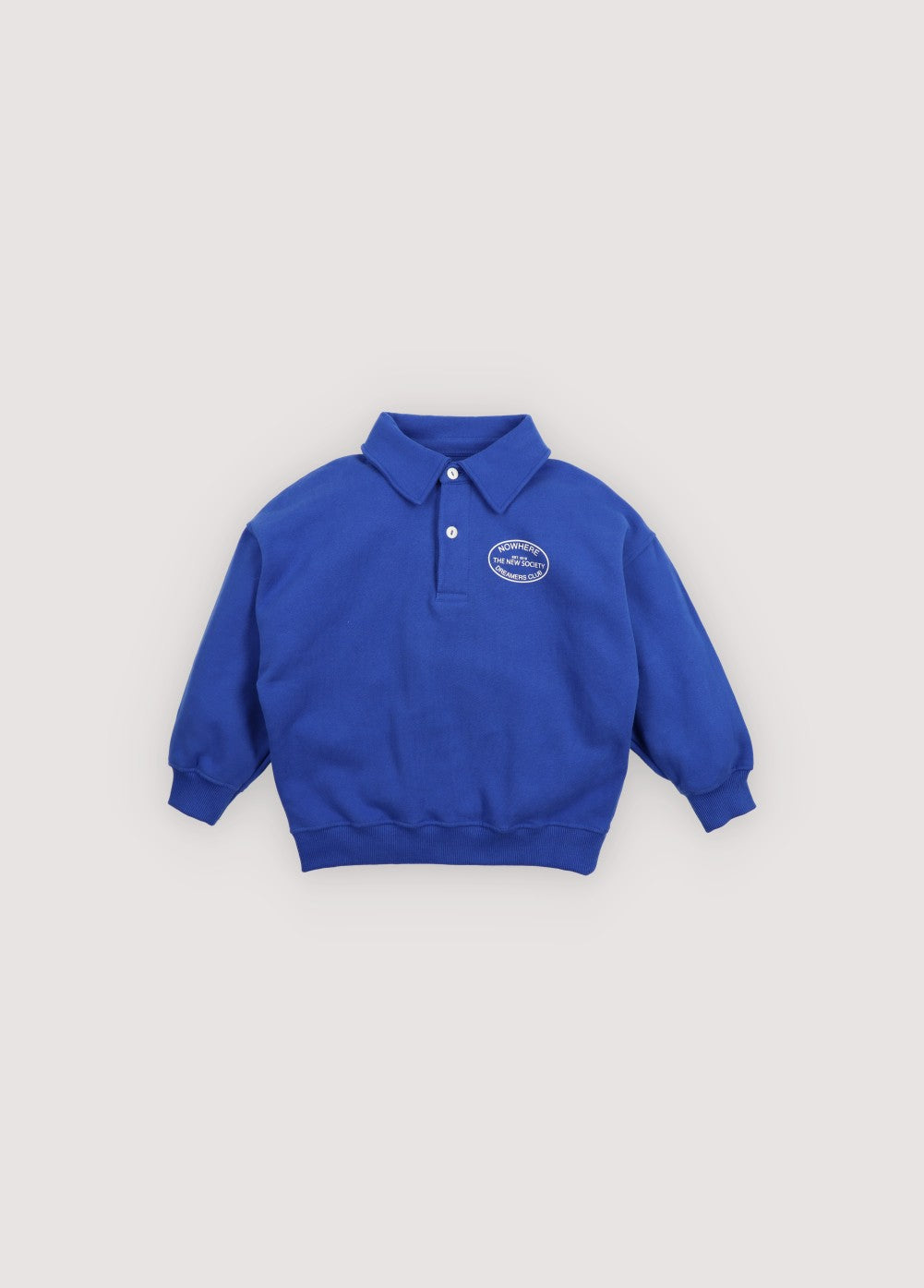 Fleece polo brushed inside and outside with a contrasting print on the front and a large print on the back. Pair with the matching t-shirt and joggers to complete the look. Brushed on the inside and outside.