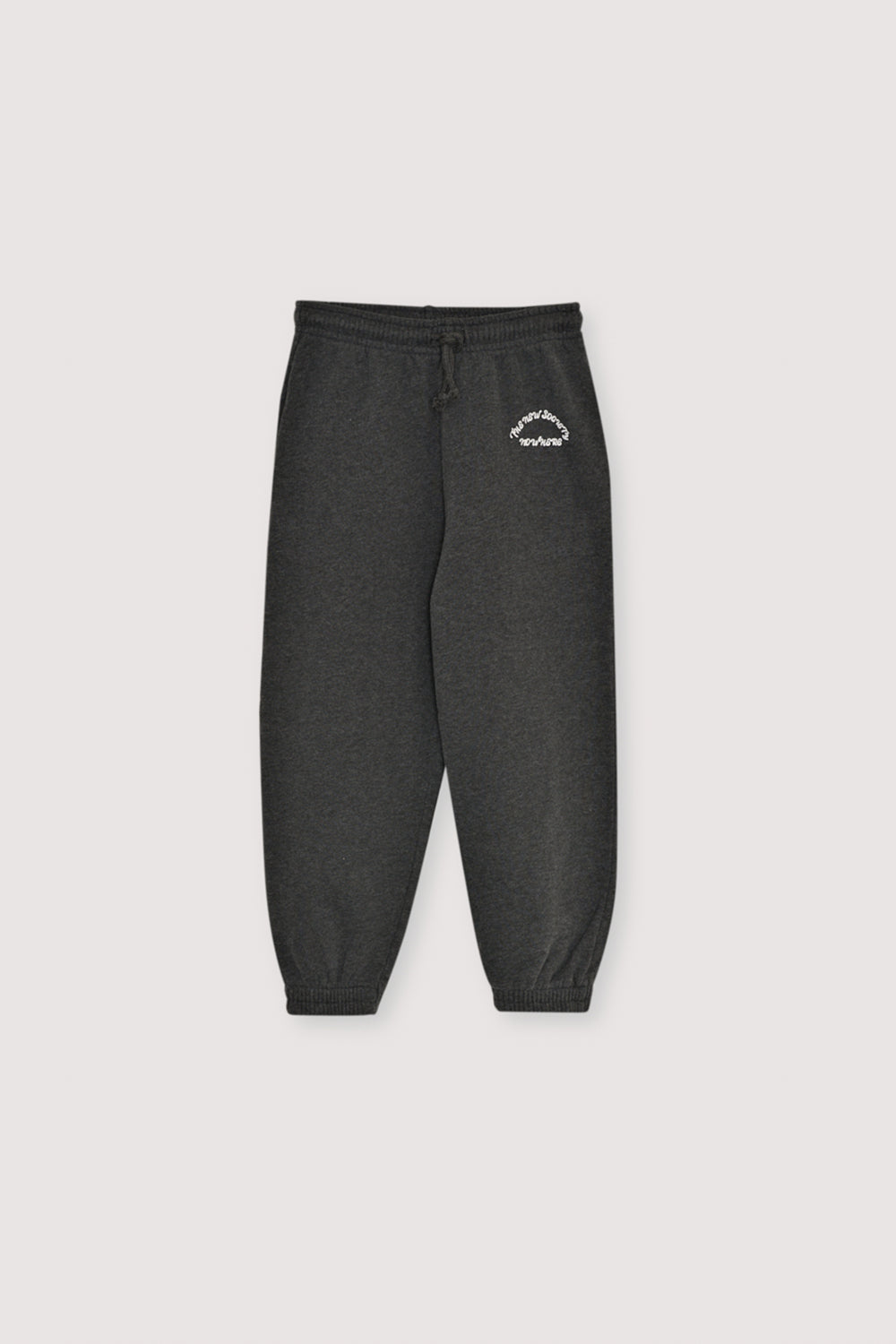 Fleece joggers brushed inside and outside  with an elastic waistband and cuffs, featuring a contrasting print detail on the front side. Brushed on the inside and outside. Pair with the matching polo and t-shirt to complete the look.