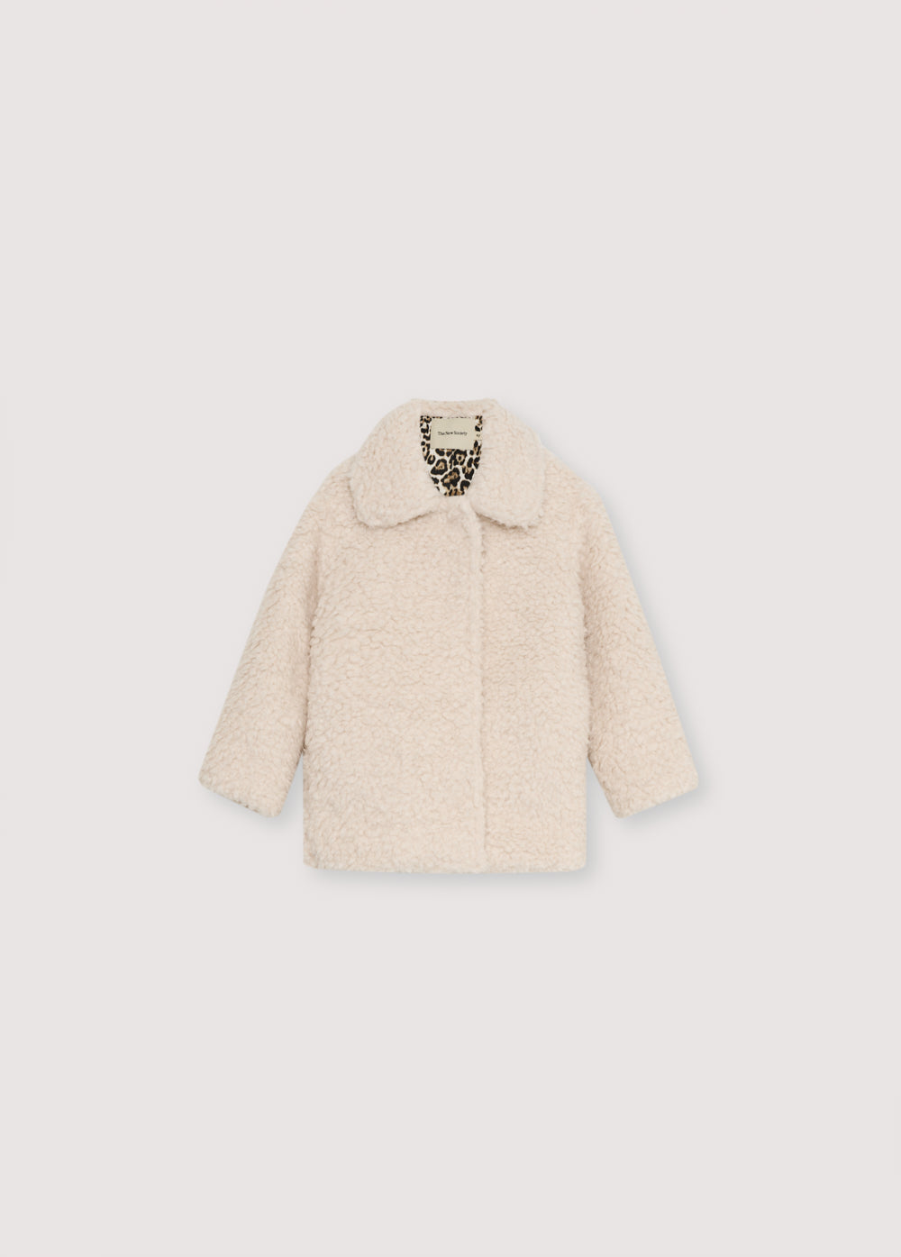 Coat with a collar and front closure with tone-on-tone snaps. It features side pockets and an interior cotton lining with a leopard print detail.