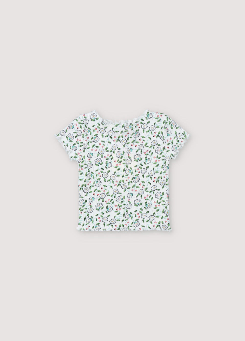 Short-sleeved ribbed t-shirt with a lovely floral print and baby overlock finishes on the collar, cuffs, and hem. It comes with matching leggings. Spring Summer Collection. The New Society. 