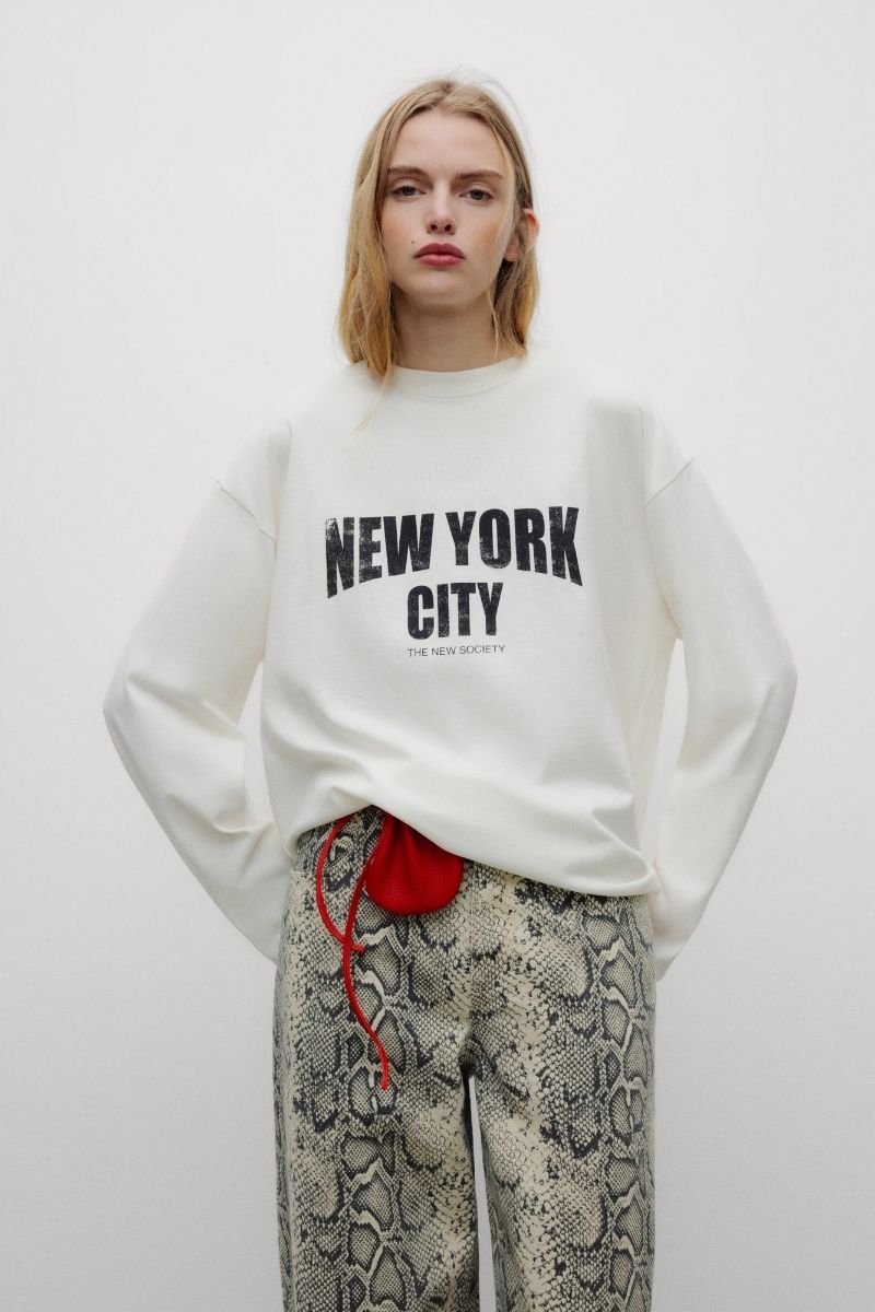The Kay Woman T-Shirt is a timeless wardrobe essential, crafted from soft cotton for everyday comfort and effortless versatility.
