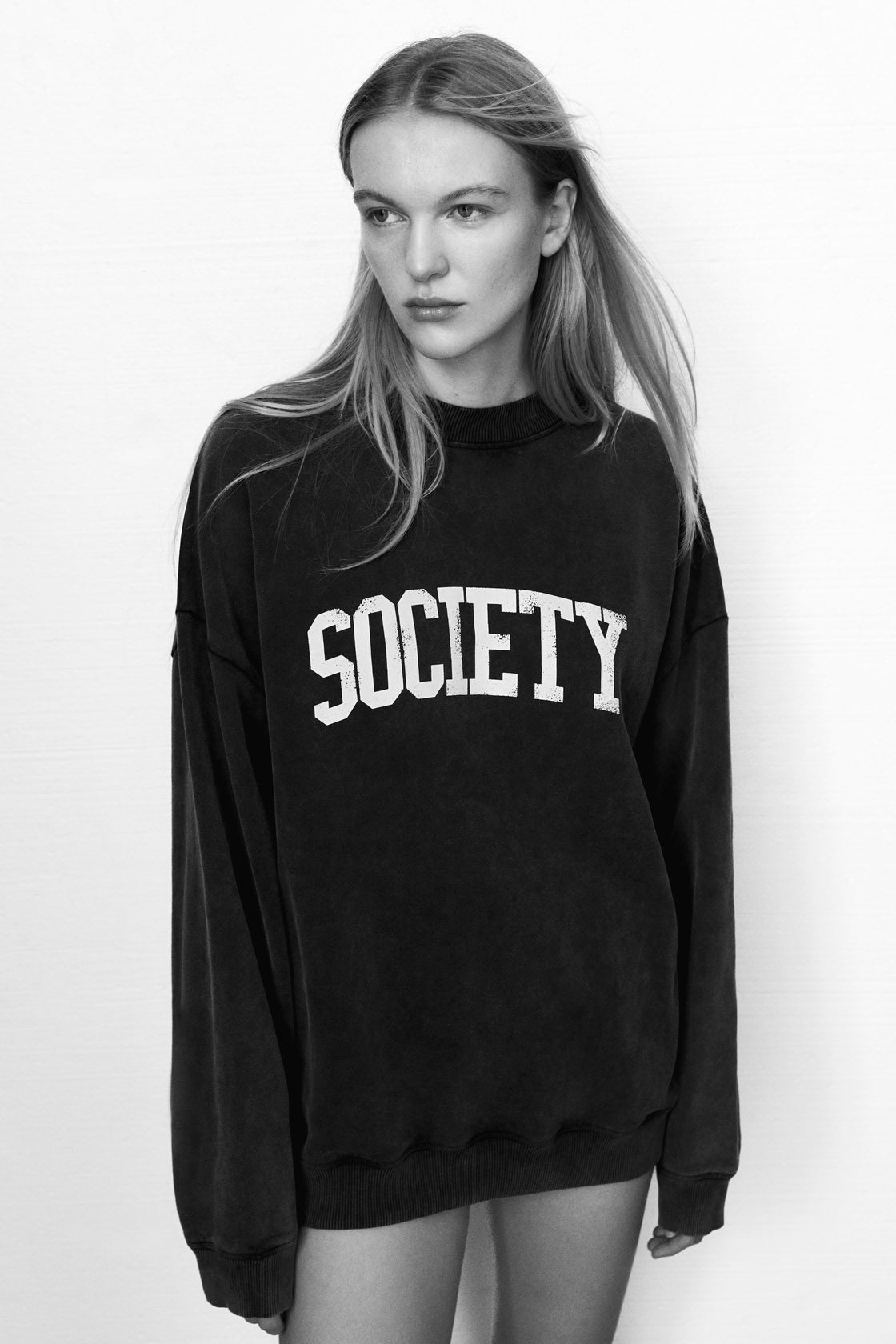 Oversized washed grey sweatshirt with a contrasting SOCIETY print on the front. Brushed on the inside and outside.