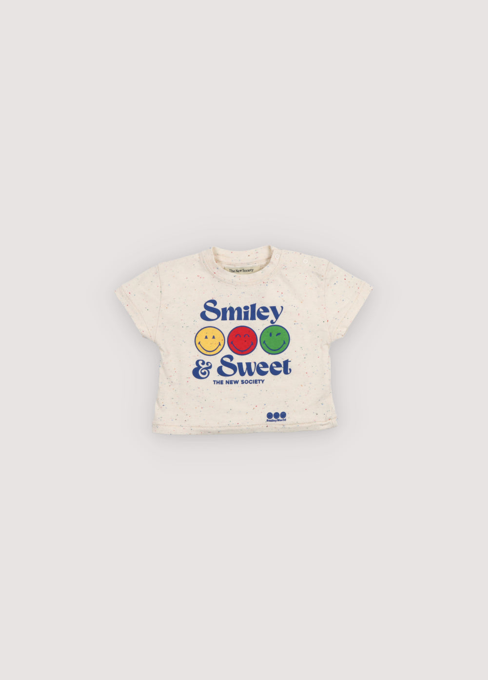 Fun speckled jersey T-shirt featuring a SmileyWorld® print on the front and shoulder snaps for easy wear, adding a playful, practical touch.