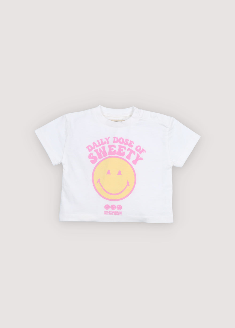 Soft cotton jersey T-shirt featuring a contrasting SmileyWorld® print on the front and a shoulder opening with snaps for easy dressing and a playful touch.