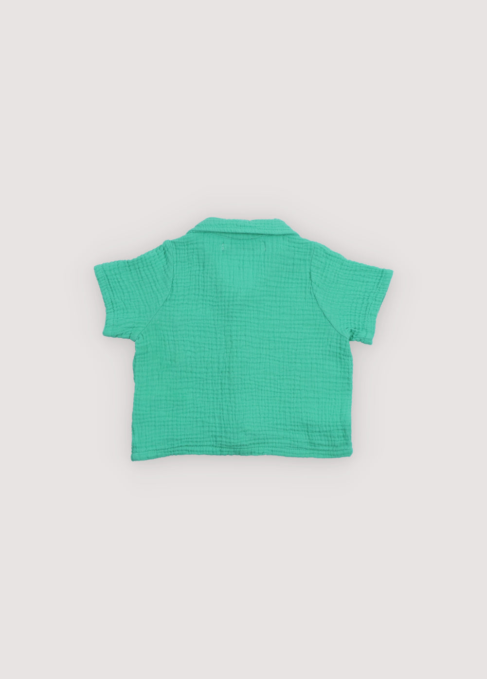 Spyros Baby Shirt in 100% cotton muslin fabric in our jade color. TNS Kids embroidery to match. Spring Summer Collection. The New Society.