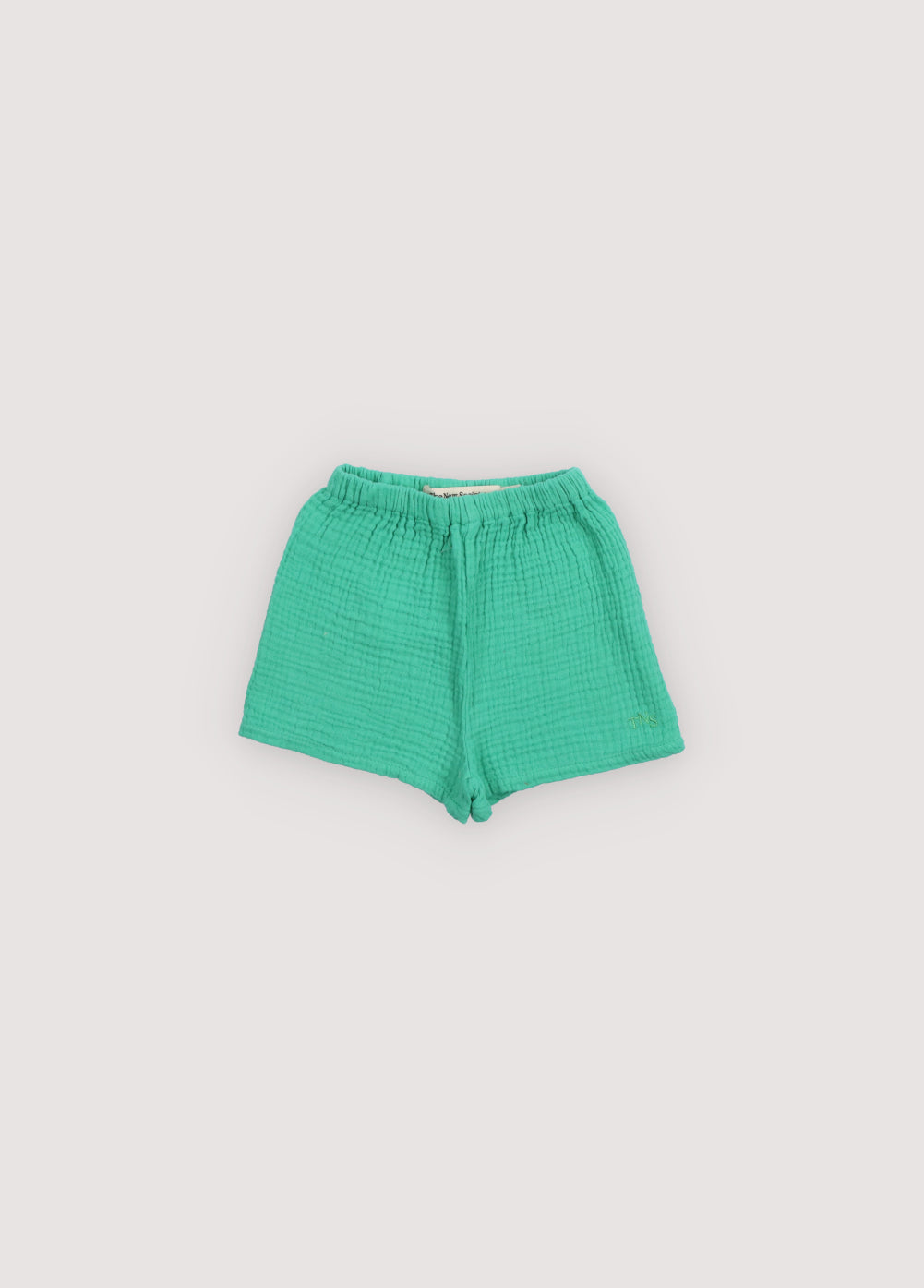 Spyros Baby Short in 100% cotton muslin fabric in our jade color. TNS Kids embroidery to match. Spring Summer Collection. The New Society.