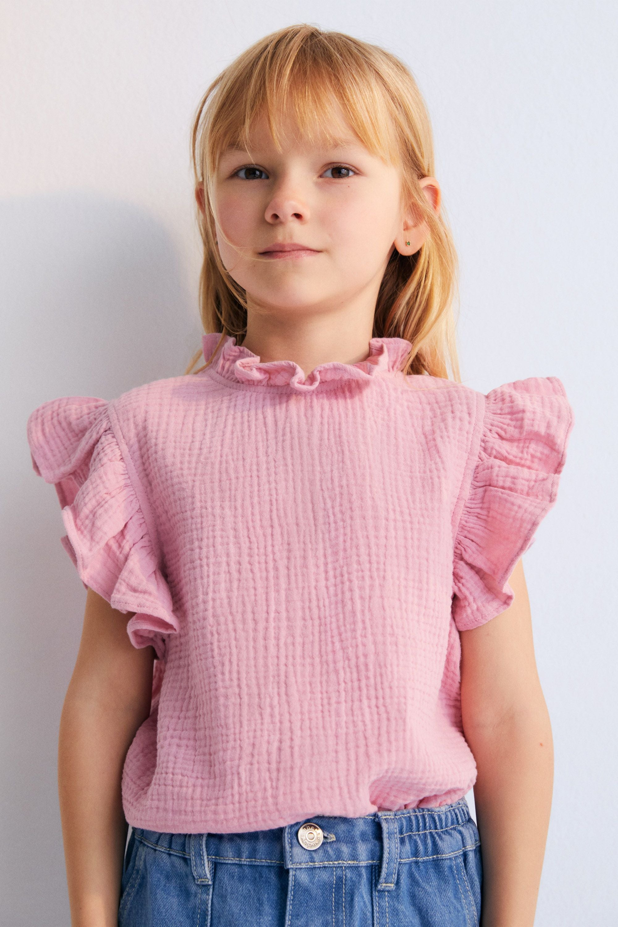 Spyros Blouse in 100% cotton muslin fabric in our hibiscus color. TNS Kids embroidery to match. Spring Summer Collection. The New Society.