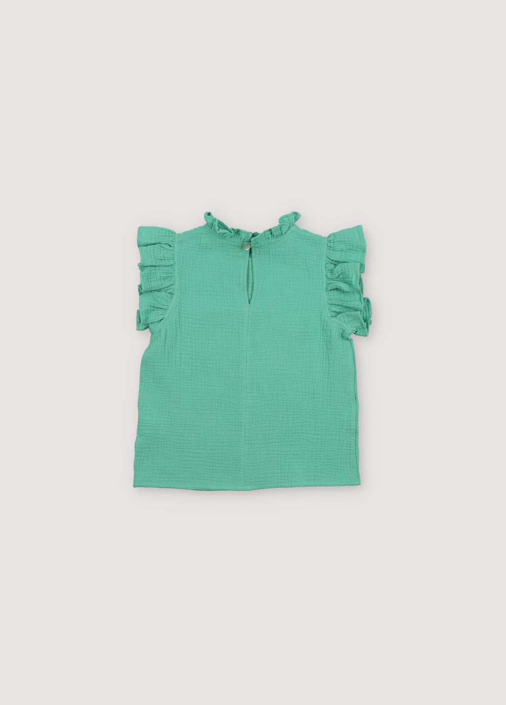 Spyros Blouse in 100% cotton muslin fabric in our jade color. TNS Kids embroidery to match. Spring Summer Collection. The New Society.