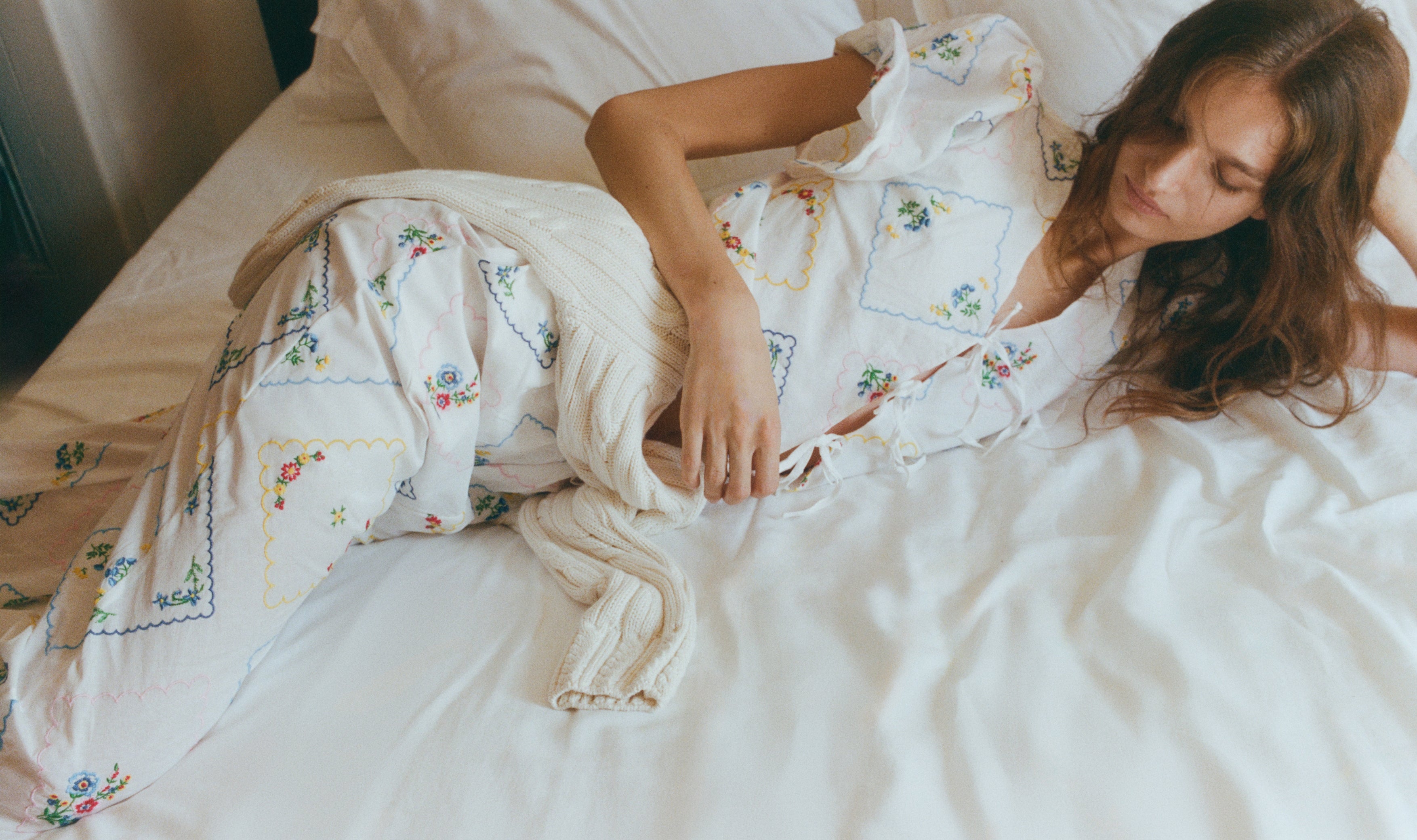 Delicate and charming, this 100% cotton woman blouse, made in Portugal, features exquisite multicolor floral embroidery throughout.
