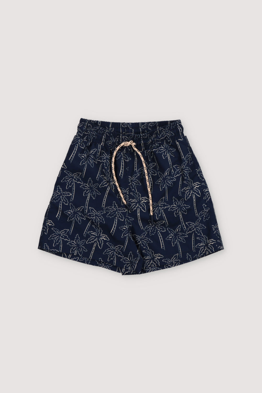 Swimsuit with contrast palm tree print on a navy background, featuring an elastic waistband with an adjustable drawstring. Spring Summer Collection.  The New Society.