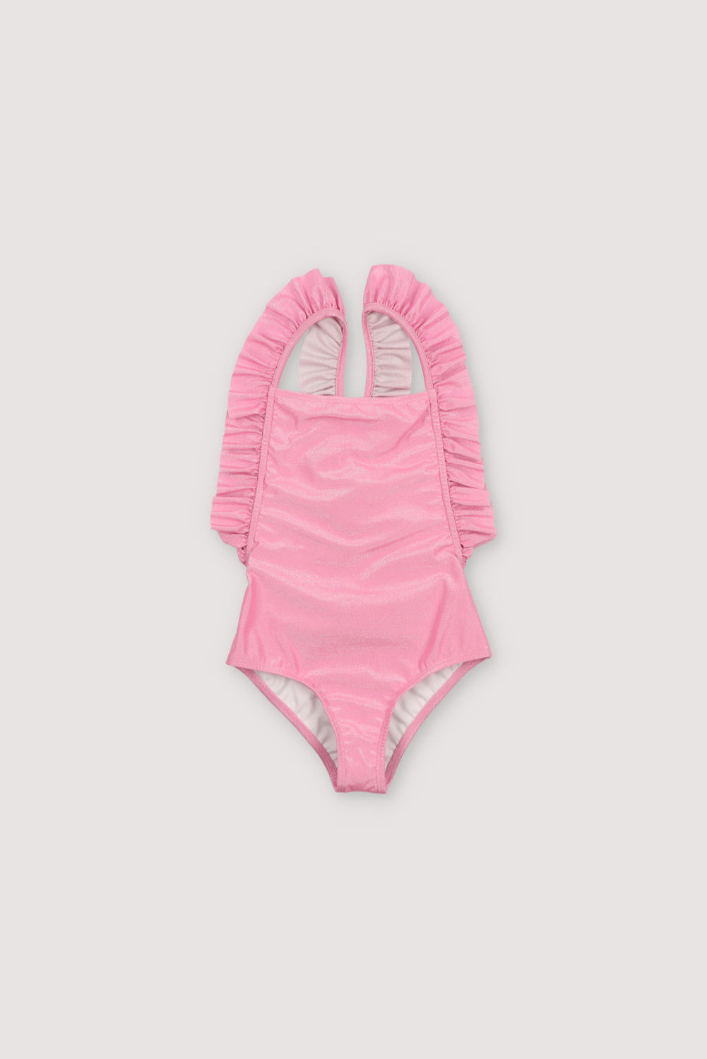 Swimsuit made of glitter fabric. It features ruffle detailing on the sides and straps and crisscross straps at the back. Spring Summer Collection. The New Society. 