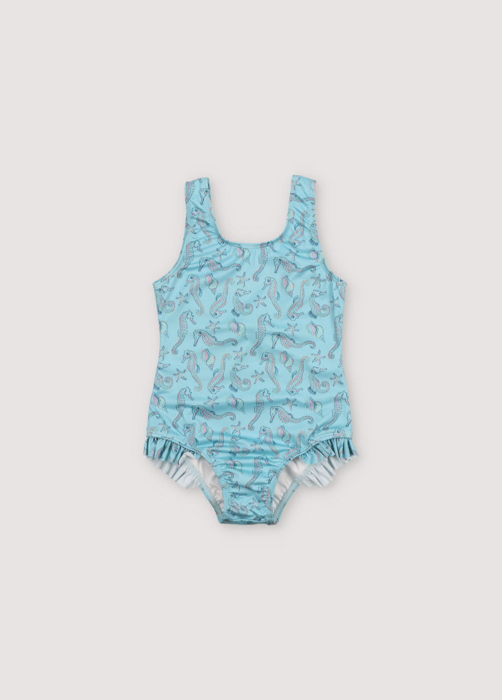Swimsuit with a fun and original seahorse print, and ruffle details on the sides. Spring Summer Collection. The New Society. 