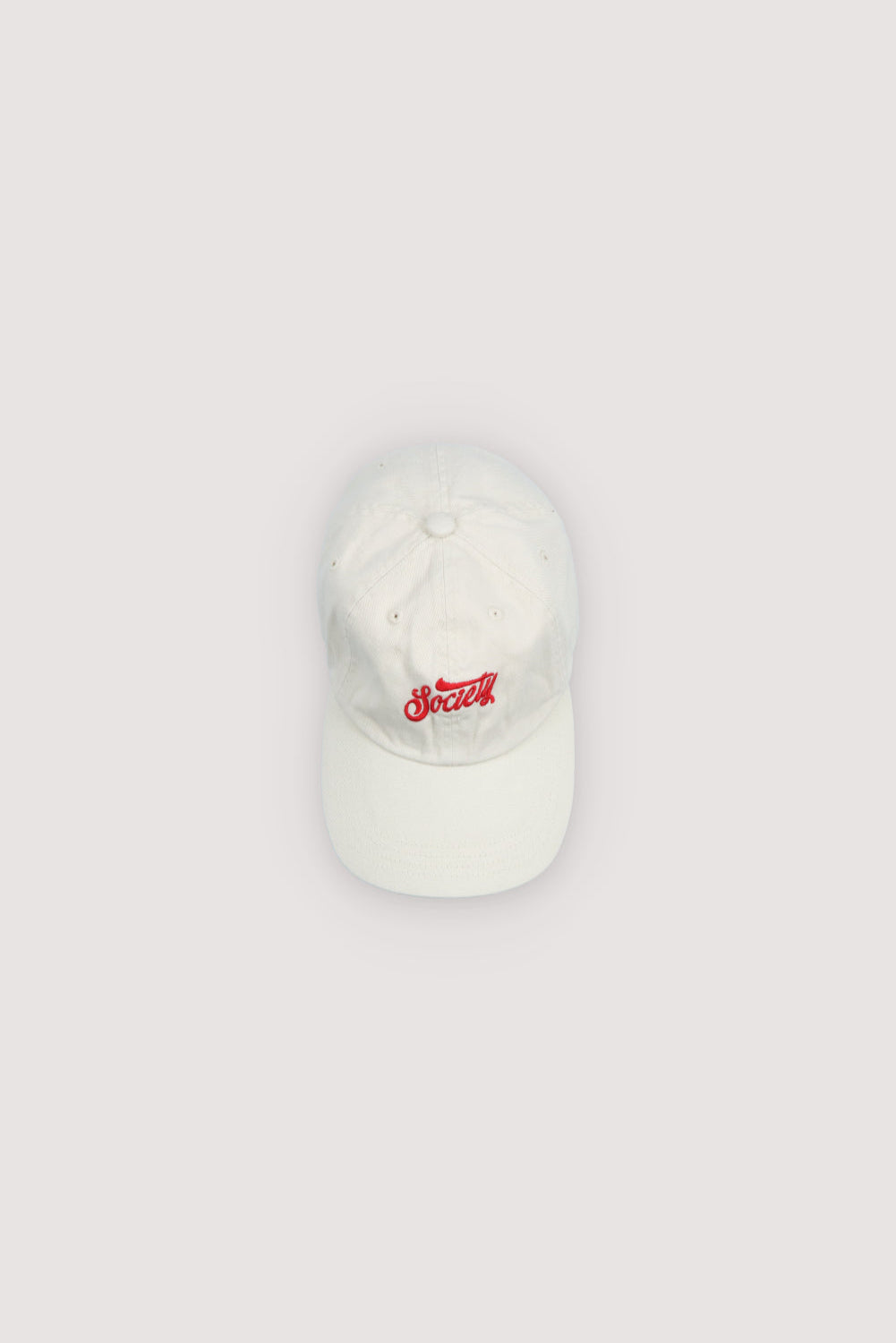 Cotton cap featuring contrasting brand embroidery on the front and an adjustable strap at the back for a comfortable, secure fit.