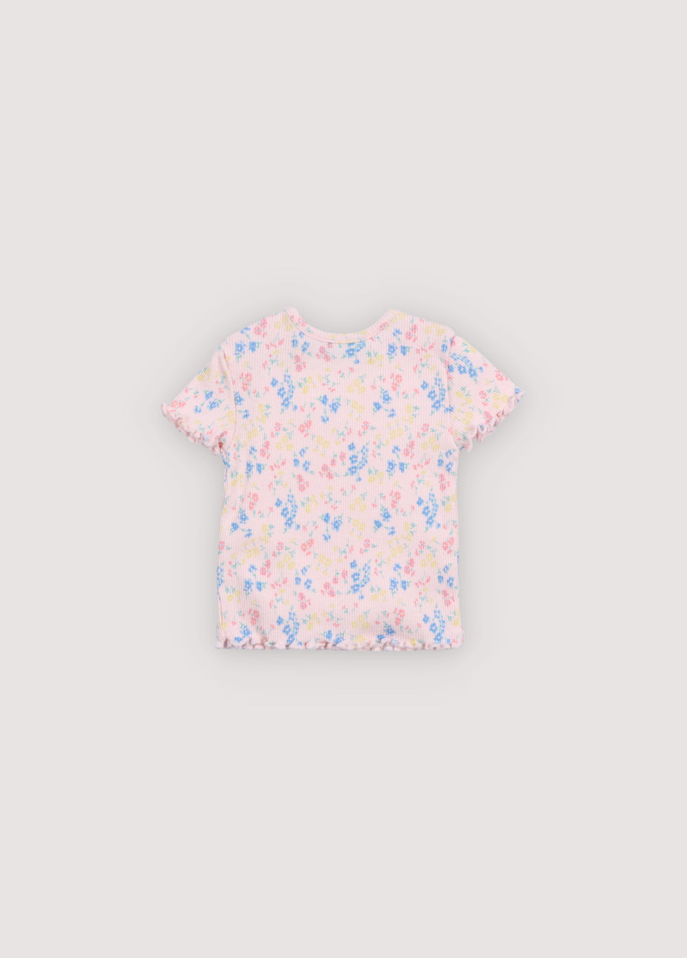 Camiseta para bebé de la nueva colección confeccionada en un delicado y suave tejido de canalé con un bonito estampado floral.