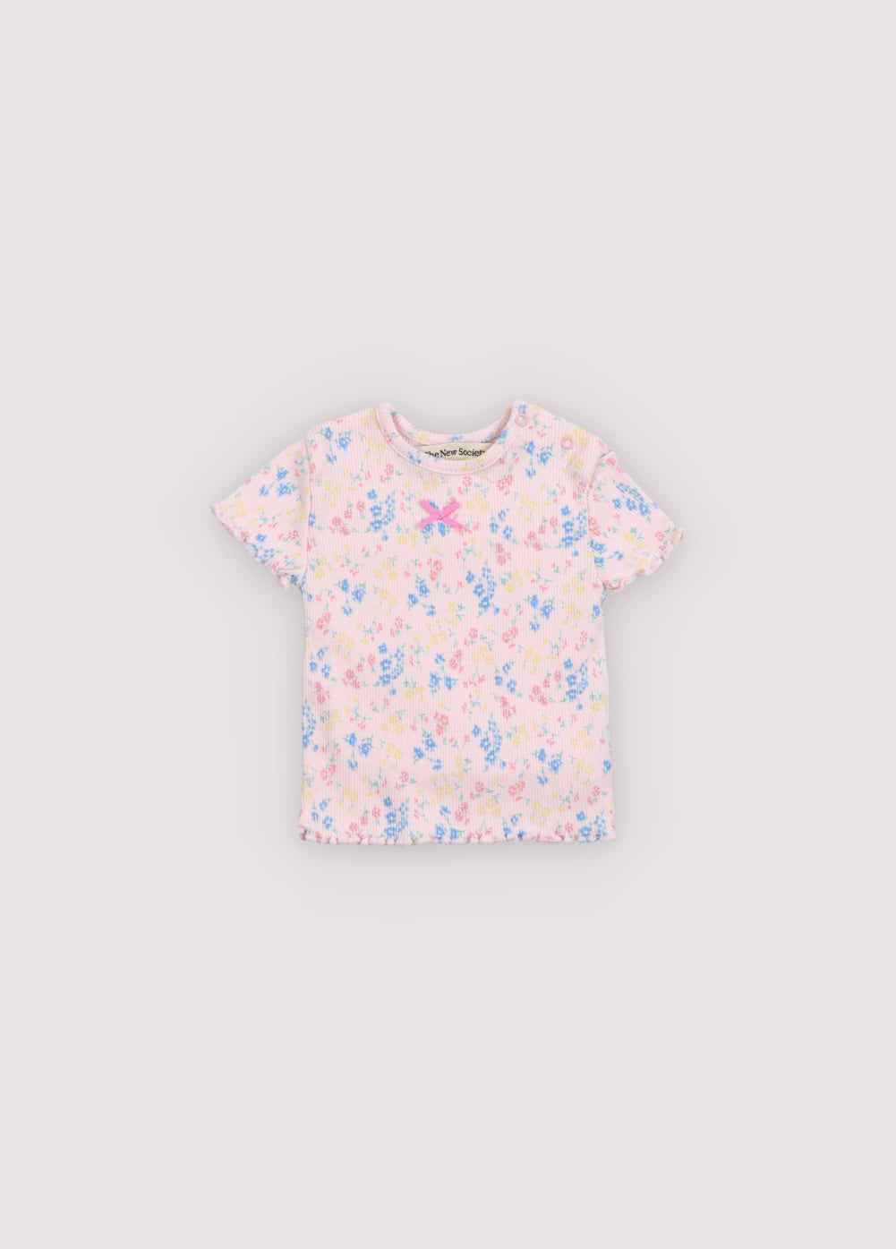 Camiseta para bebé de la nueva colección confeccionada en un delicado y suave tejido de canalé con un bonito estampado floral.