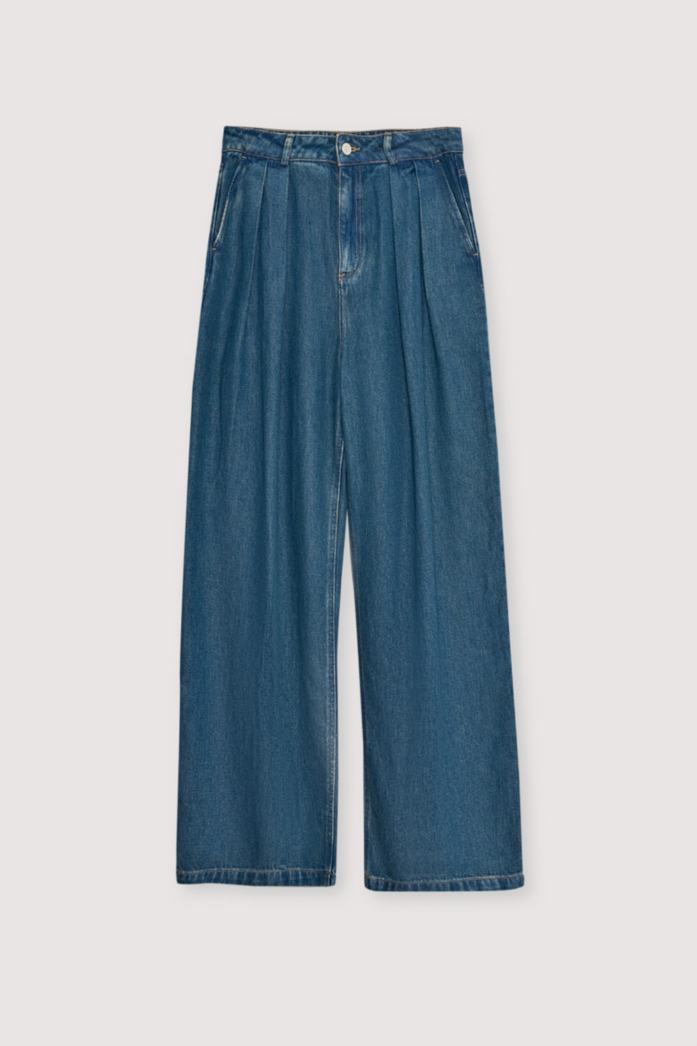 A customer favorite, these straight-leg Tencel trousers in blue denim offer a soft drape and a clean, tailored look