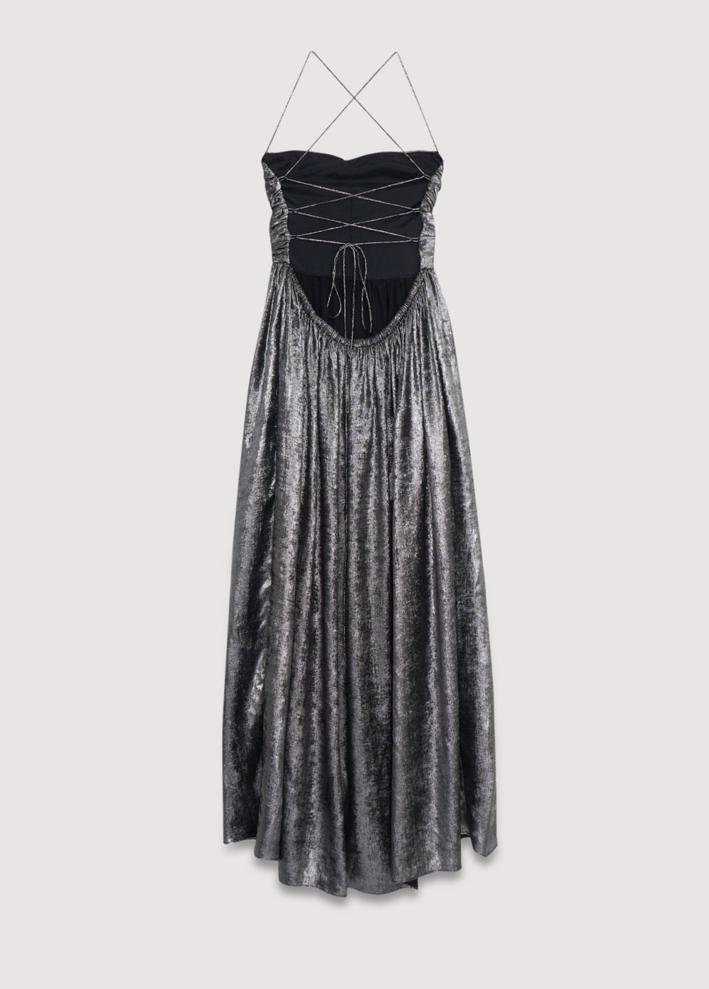 Silver shine dress with a waist cut and front ruching. It features spaghetti straps that cross at the back and a zipper closure.