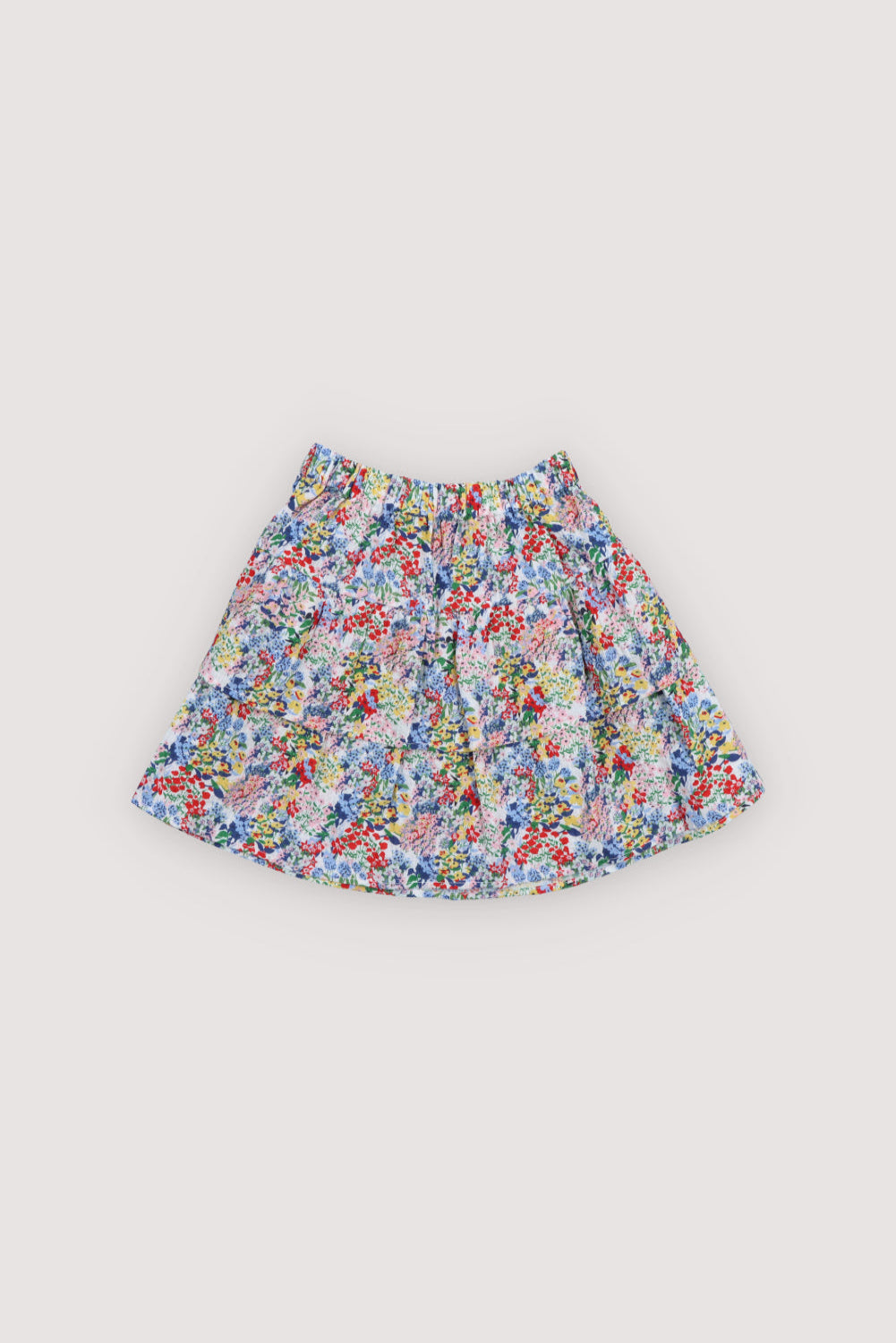 Seersucker cotton skirt featuring a floral print, double ruffle detail, and elastic waistband for a comfortable fit.