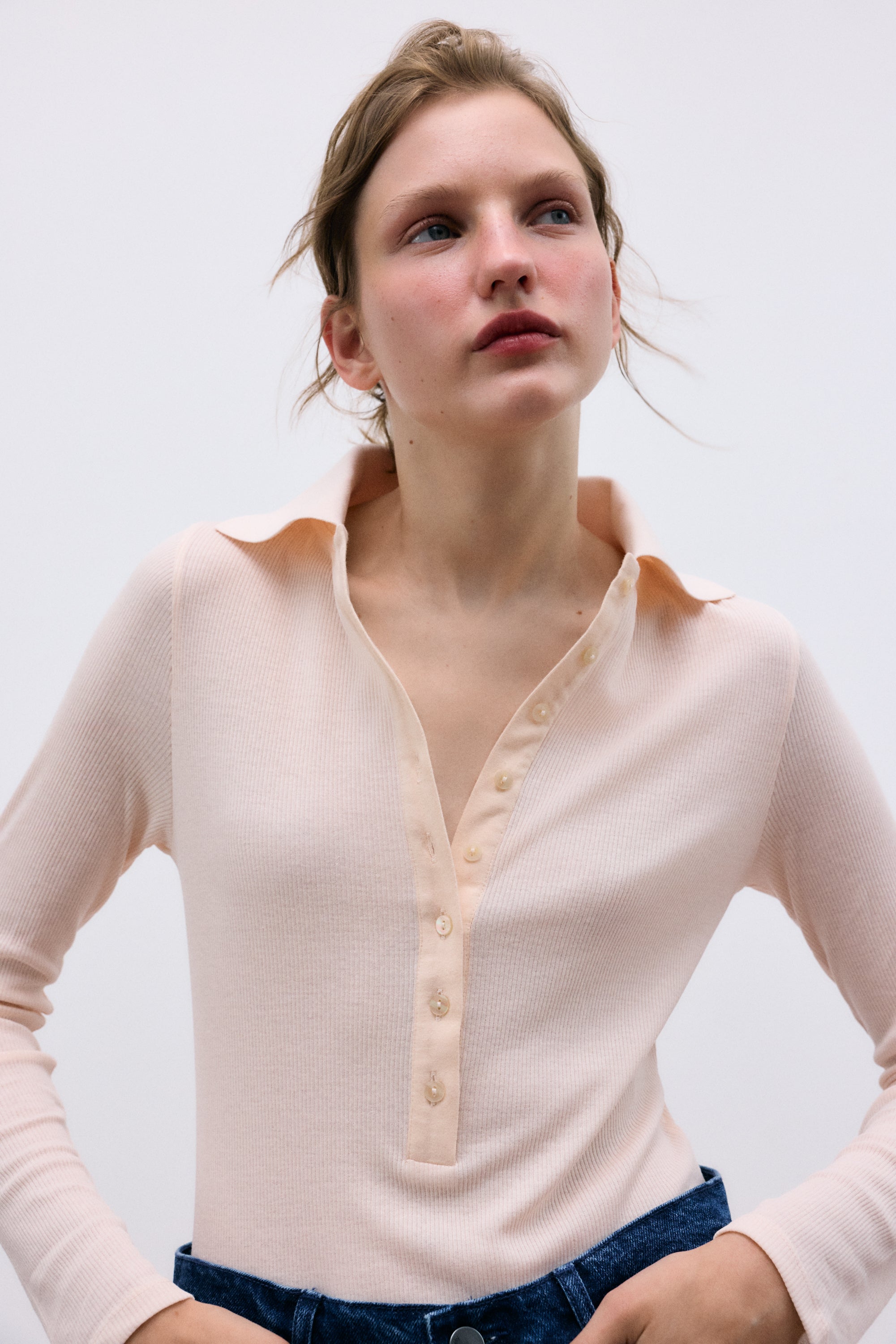 Fine rib body crafted from recycled cotton, designed for a sleek and comfortable fit