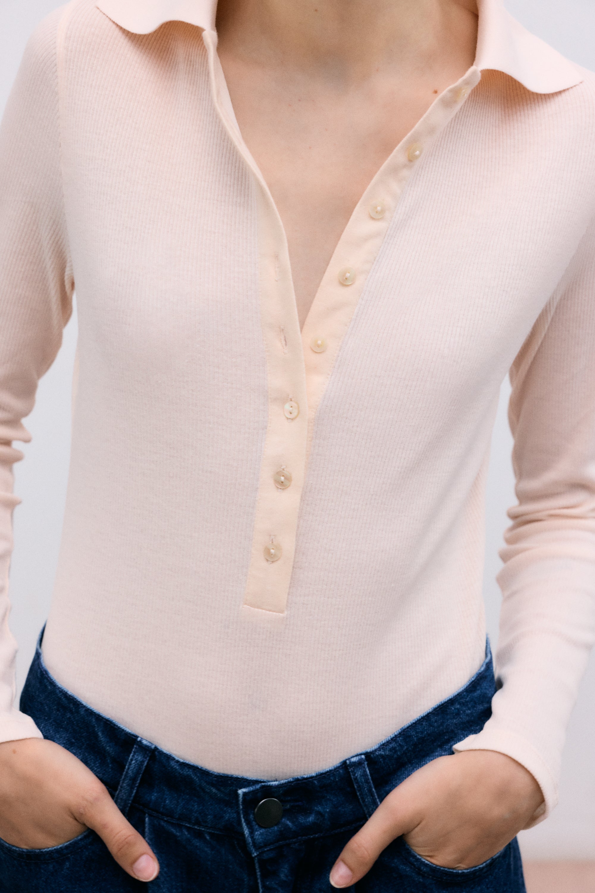 Fine rib body crafted from recycled cotton, designed for a sleek and comfortable fit