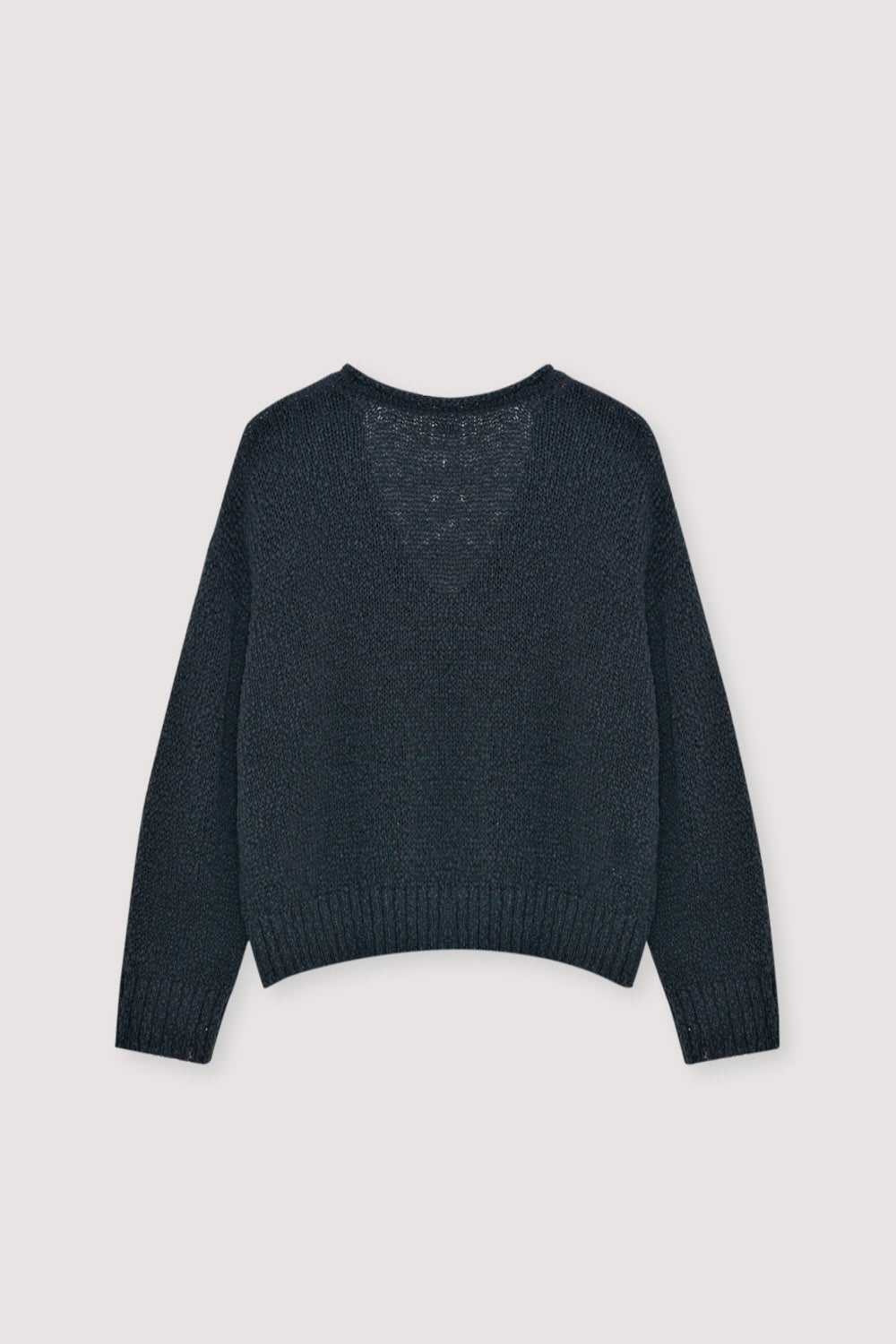 100% cotton sweater crafted with a rustic knit texture for a natural yet modern look.