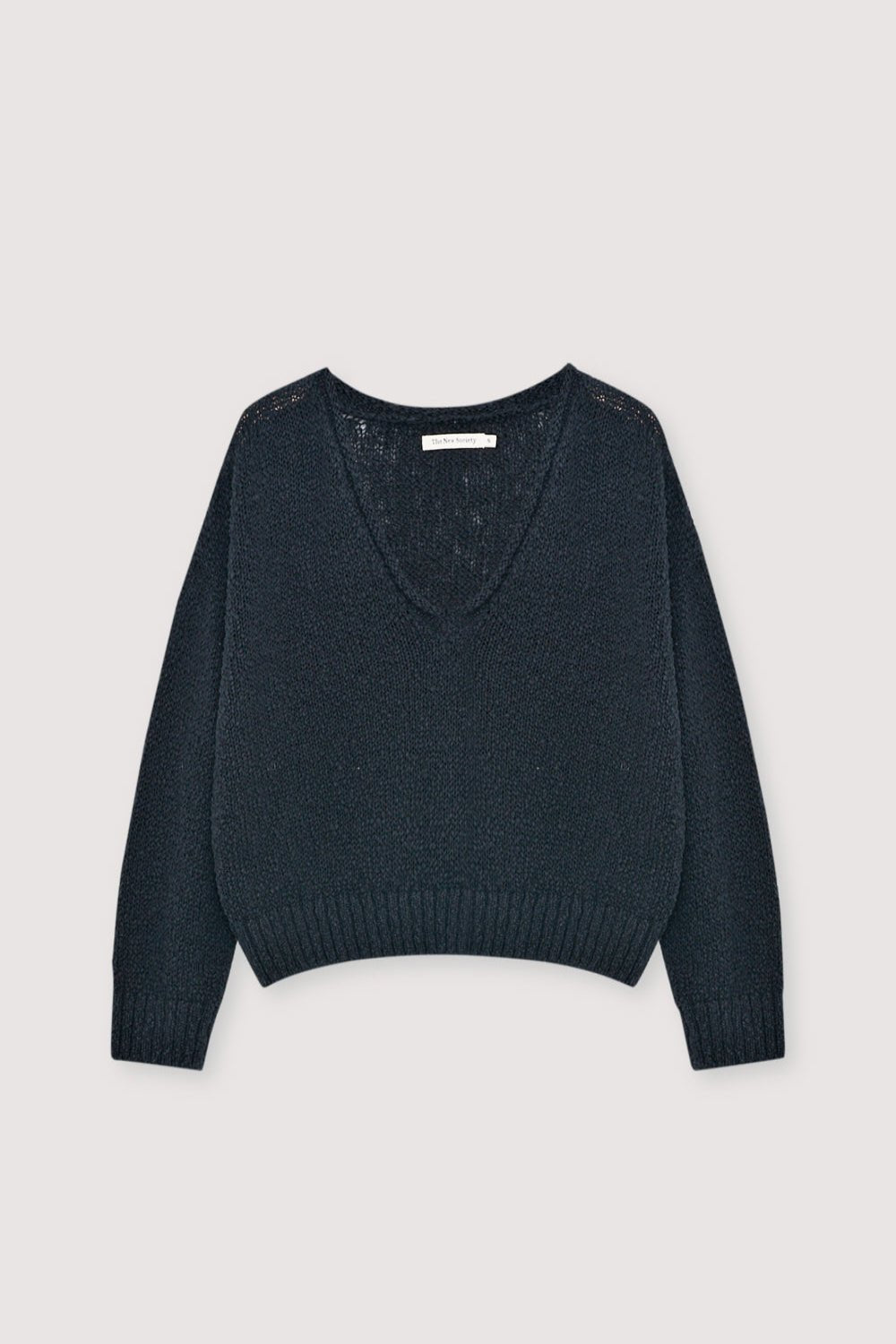 100% cotton sweater crafted with a rustic knit texture for a natural yet modern look.