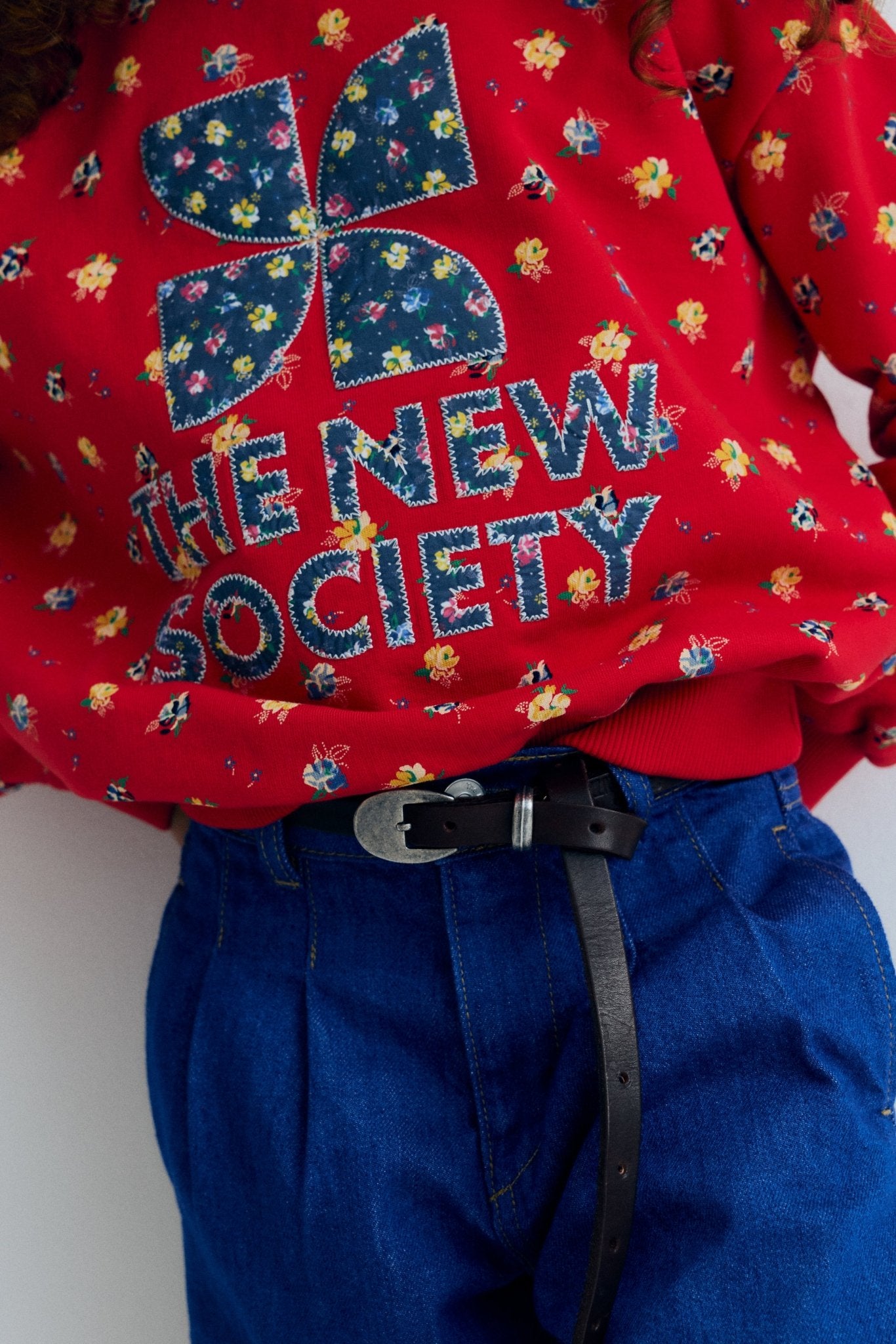 Our classic logo sweatshirt is crafted from 100% soft cotton for everyday comfort and timeless wear. Reimagined with a fresh multicolor floral print, it features a floral-print patch logo and contrasting stitch details that bring a quiet yet expressive energy to the piece.