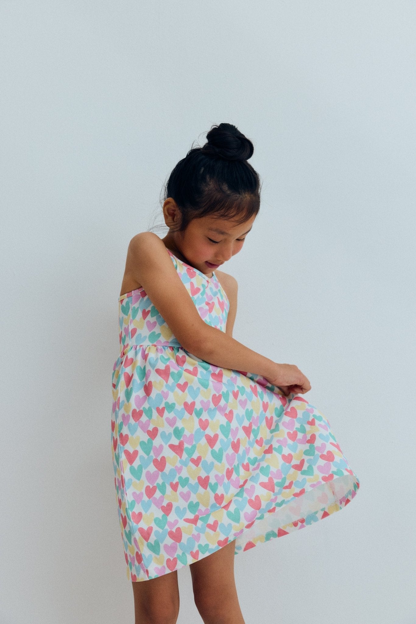 Dress crafted in fine, soft cotton elastane terry, featuring a fun and colourful heart print.