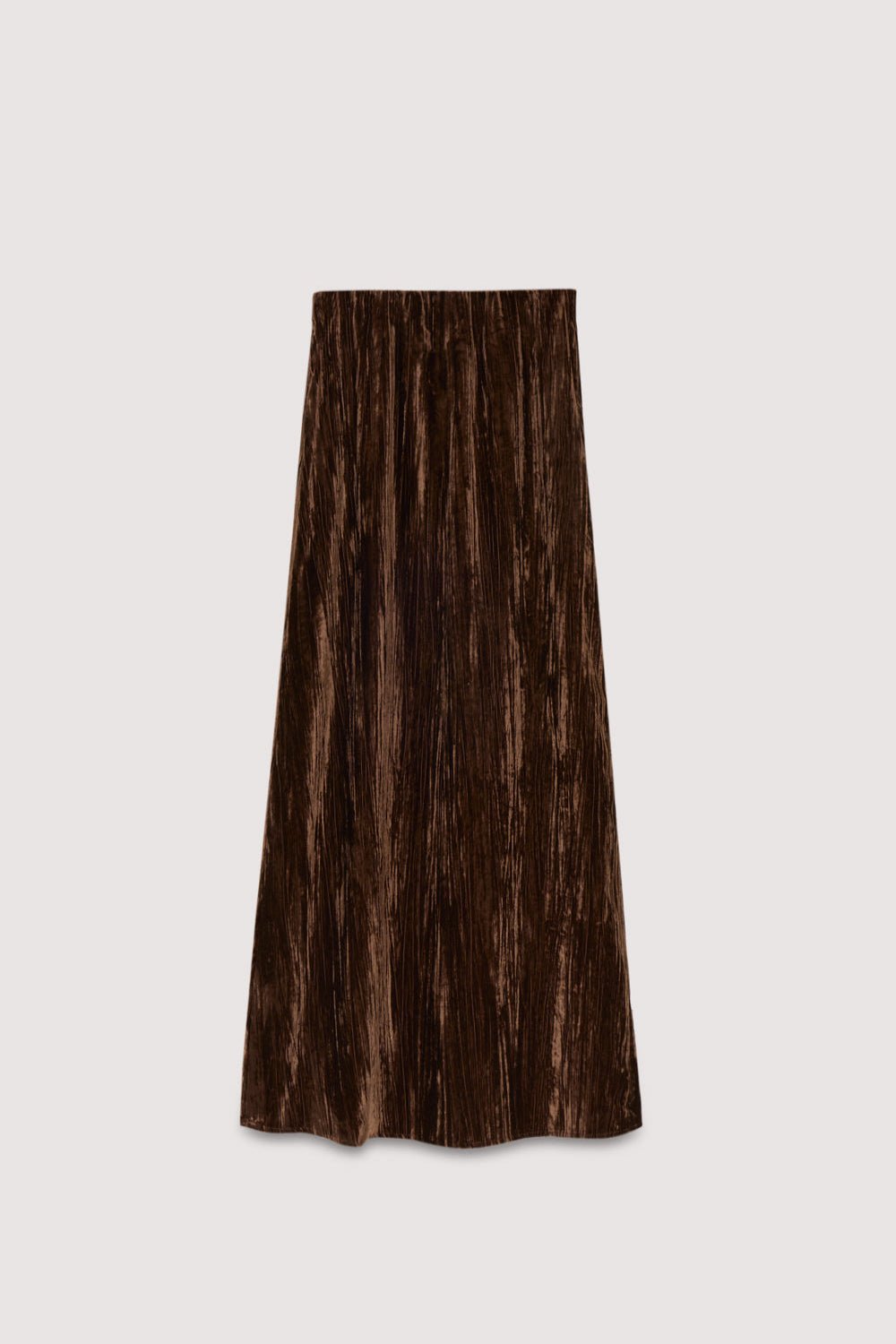 Cette jupe droite légèrement trapèze en velours de couleur Roast offre une texture douce et une silhouette épurée, finie avec une fermeture éclair latérale discrète pour un port facile. Collection Femme AW25. The New Society