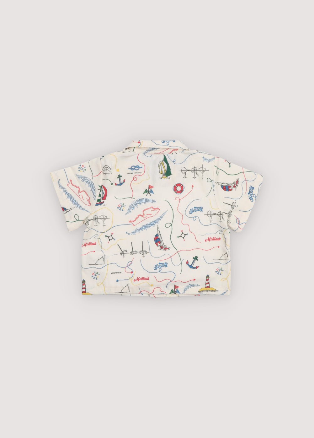 Short sleeve shirt in&nbsp;soft cotton featuring a unique multicolor map print and a front button closure with wooden buttons.