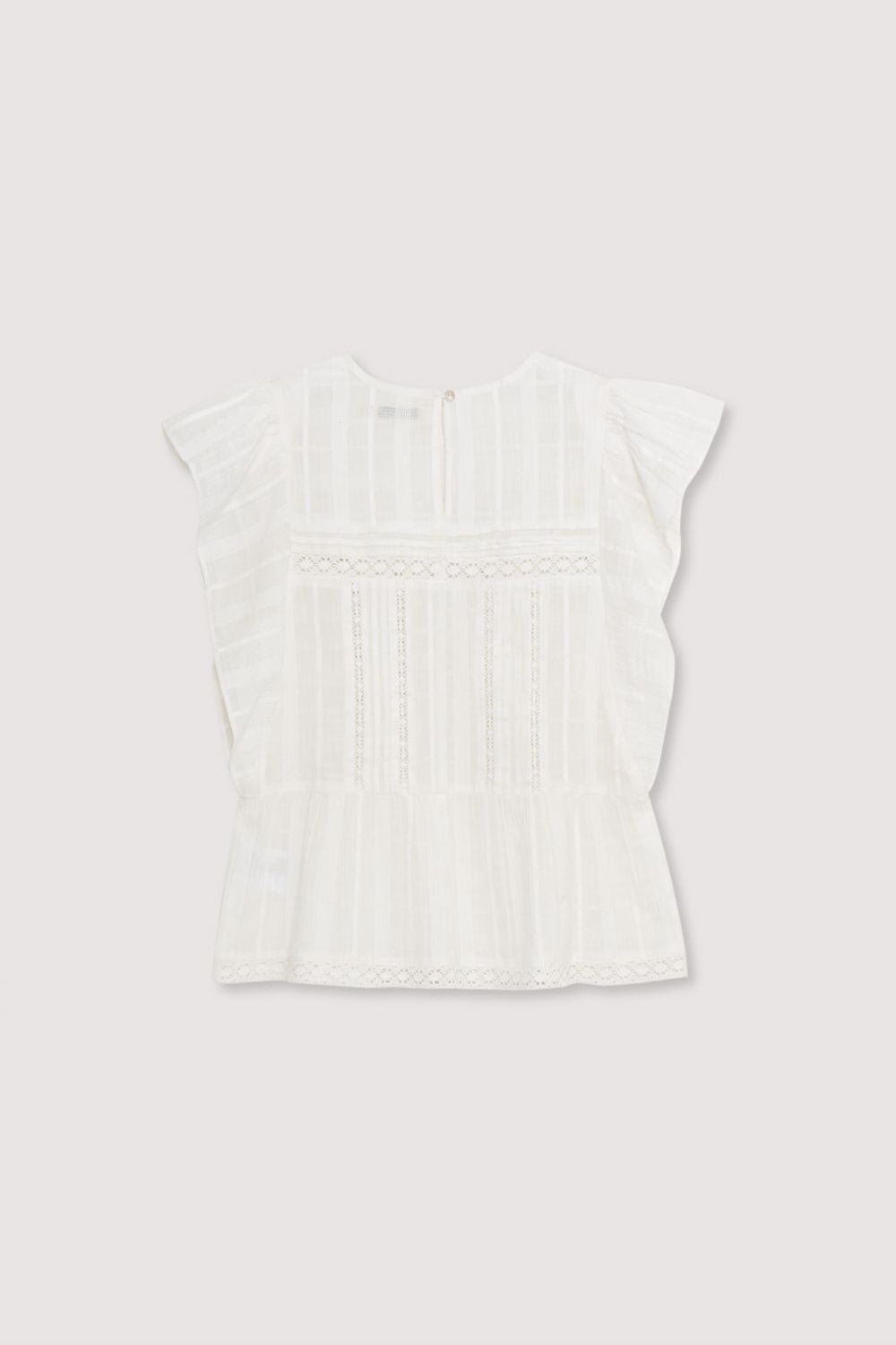 Blouse with jacquard fabric and lace details. It features ruffles on the sleeves and an opening at the back with mother-of-pearl button. Spring Summer Collection. The New Society.