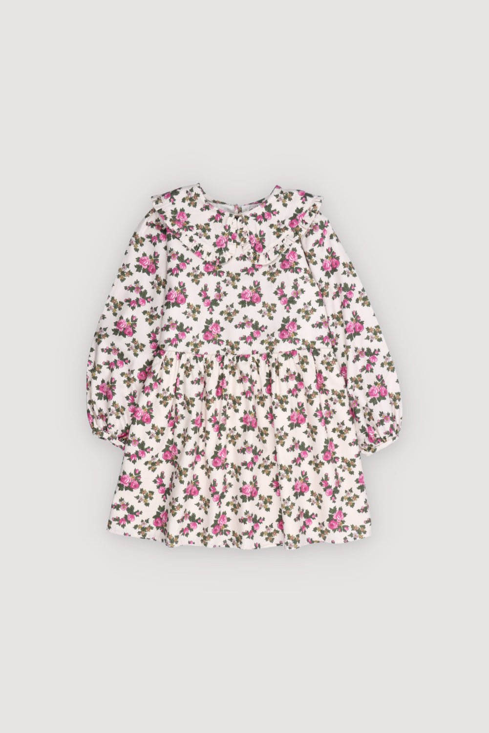This dress in soft flannel features the delicate Elyse Print, a subtle floral pattern that adds a timeless touch. 