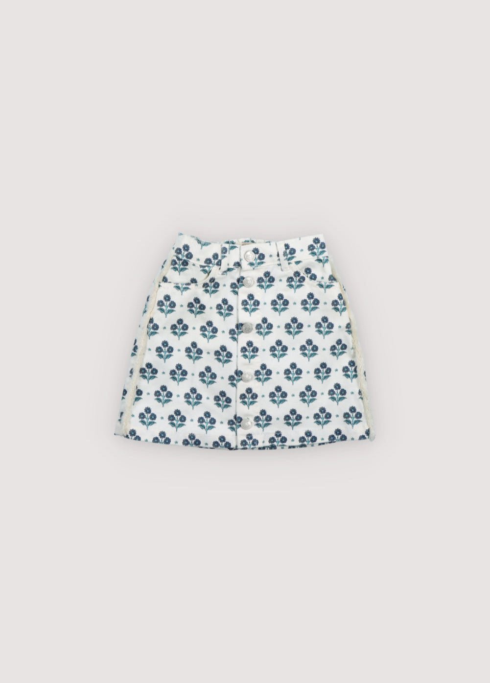 Short denim skirt with a lovely stamp print and a front slit with branded button closure. Spring Summer Collection. The New Society.