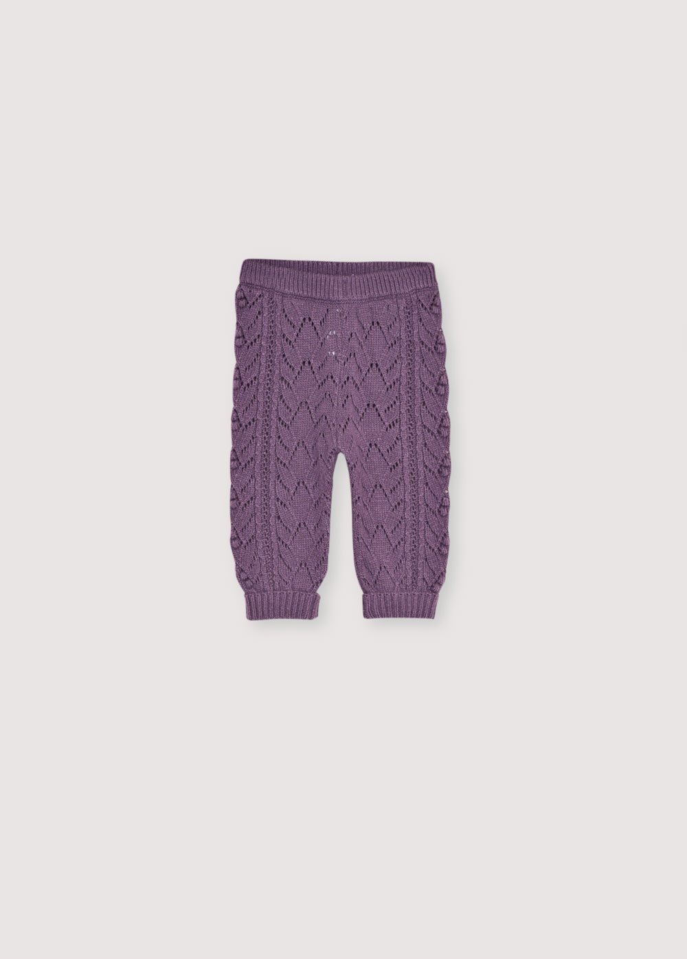 Leggings en cachemire et laine recyclés avec un magnifique design en tricot. Il est accompagné d'un cardigan assorti pour créer un look complet.
