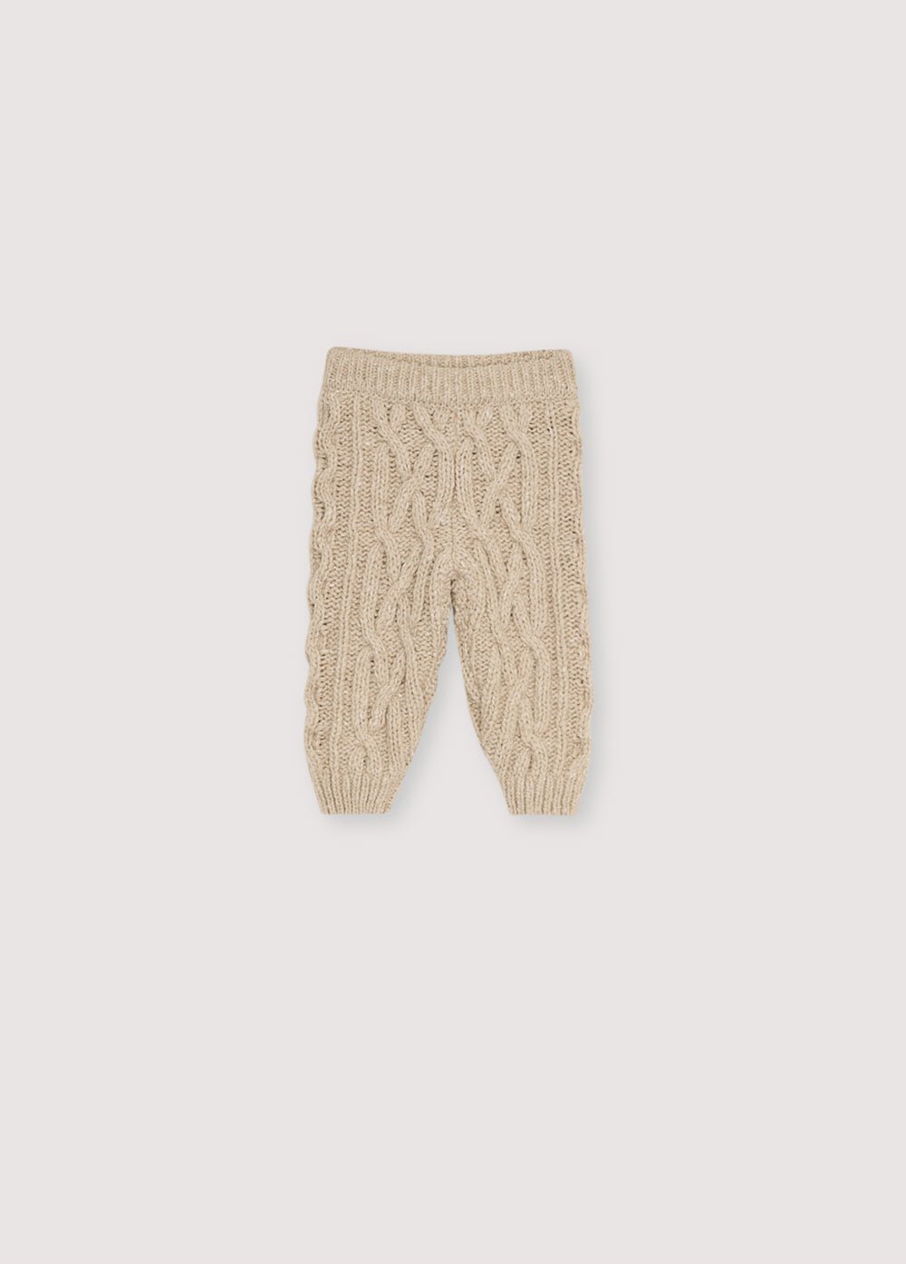 Leggings en cachemire et laine recyclés avec un magnifique design en tricot. Il est accompagné d'un cardigan assorti pour créer un look complet.