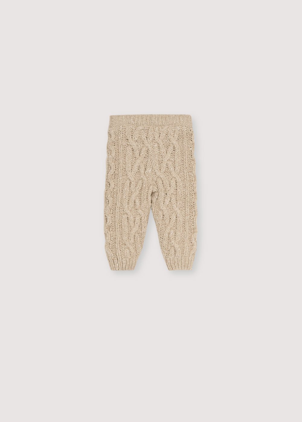 Leggings en cachemire et laine recyclés avec un magnifique design en tricot. Il est accompagné d'un cardigan assorti pour créer un look complet.
