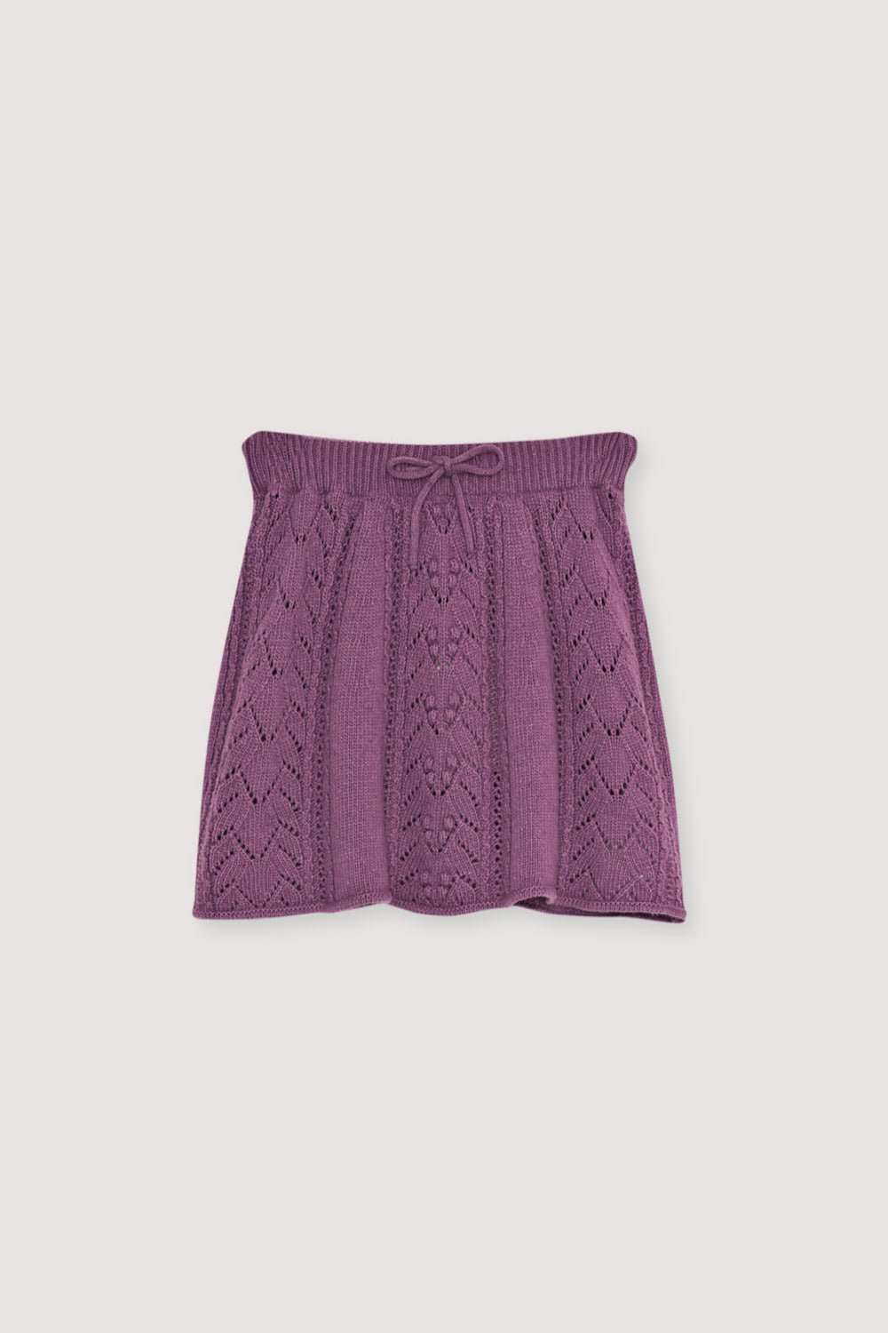 This knit skirt in Grape Bliss combines recycled cashmere and wool for a soft, sustainable fabric blend. 