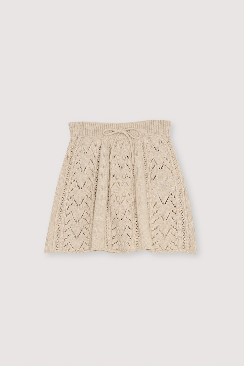 This Moonlight White skirt is crafted from a luxurious blend of recycled cashmere and wool, offering a soft, elevated feel.