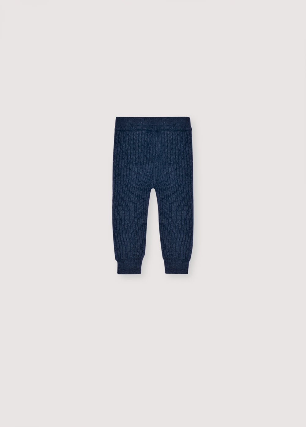 Legging en mohair en fine maille côtelée avec taille réglable et cordon. Il s'associe parfaitement au cardigan assorti pour créer un look complet.