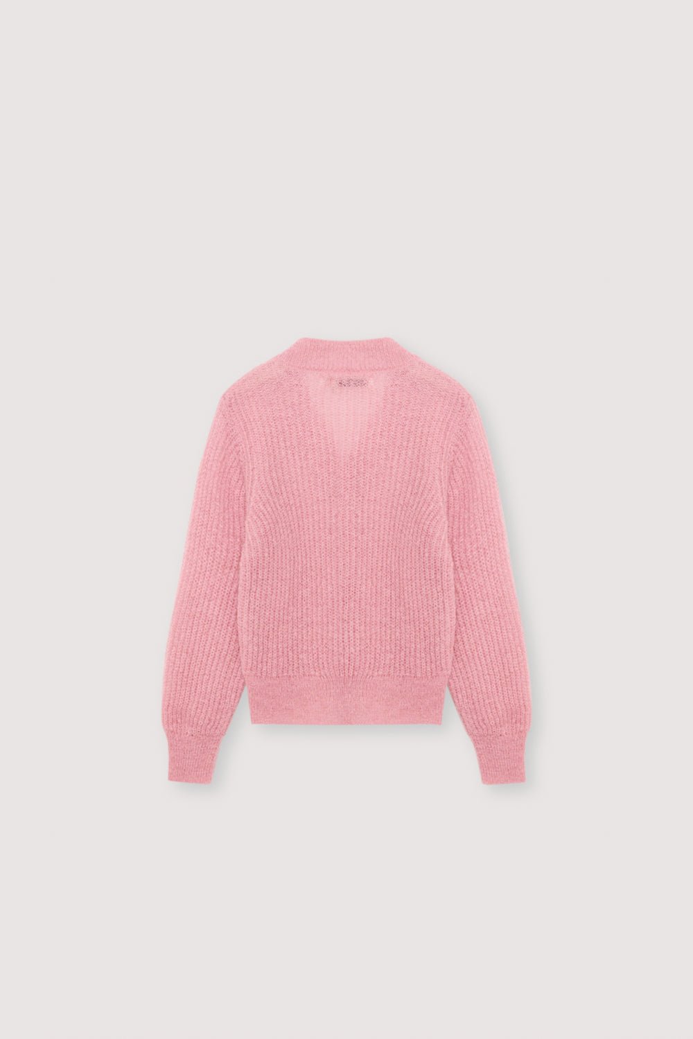 Cárdigan de mohair en punto fino de canalé con cuello de pico y originales botones plateados en forma de corazón. Combina perfectamente con unos leggings de punto a juego para un look completo. Presenta un bordado TNS a tono en el bajo de canalé.